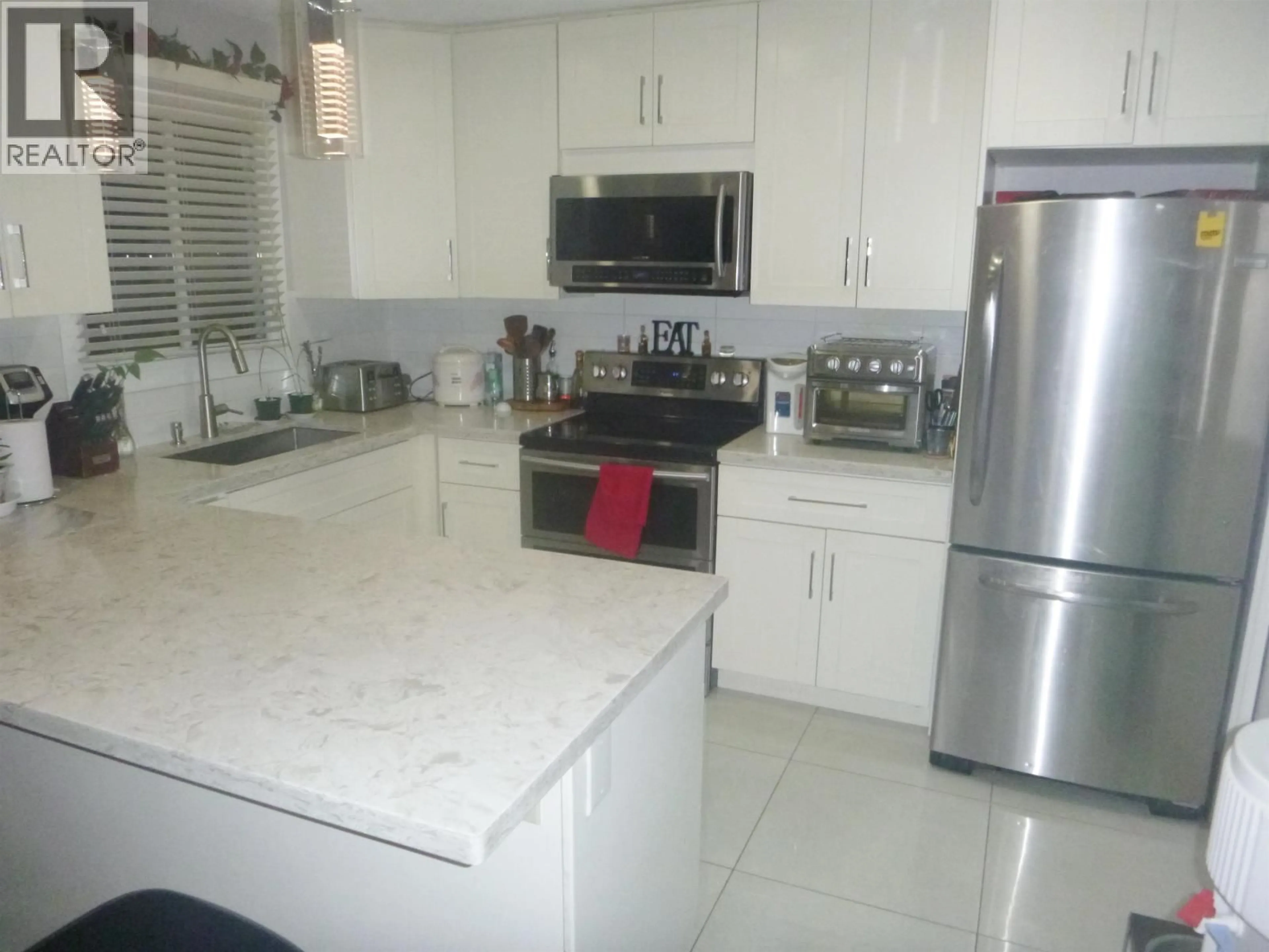 Open concept kitchen, ceramic/tile floor for 11171 STEVESTON HIGHWAY, Richmond British Columbia V7A1N7