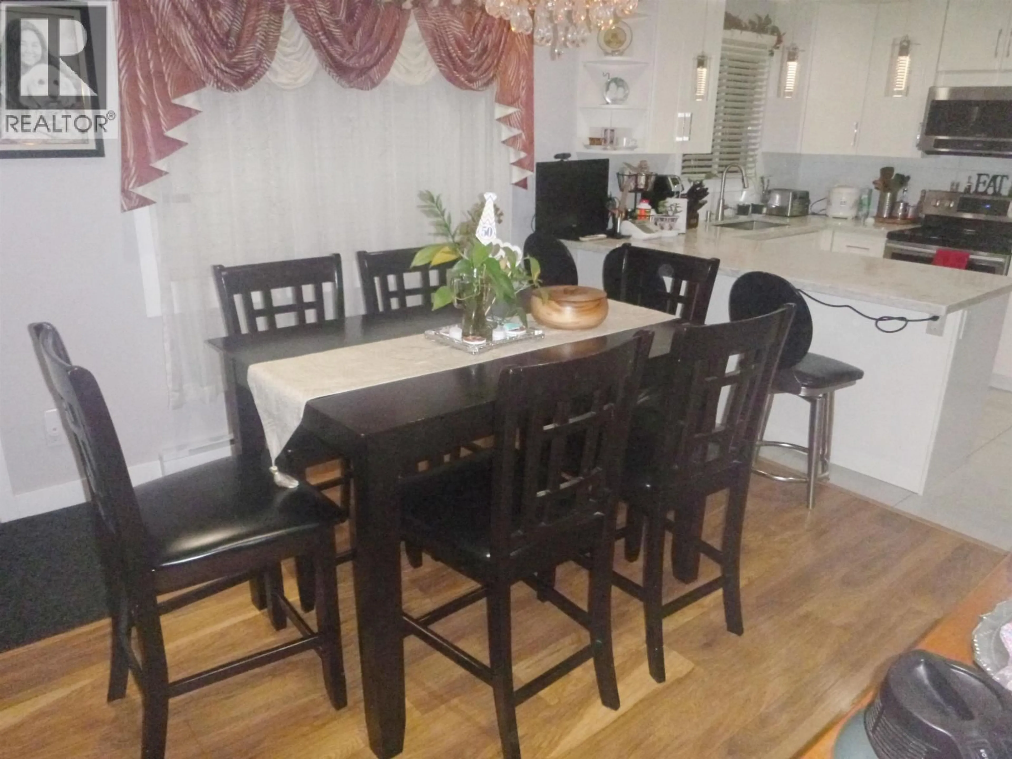 Dining room, wood/laminate floor for 11171 STEVESTON HIGHWAY, Richmond British Columbia V7A1N7