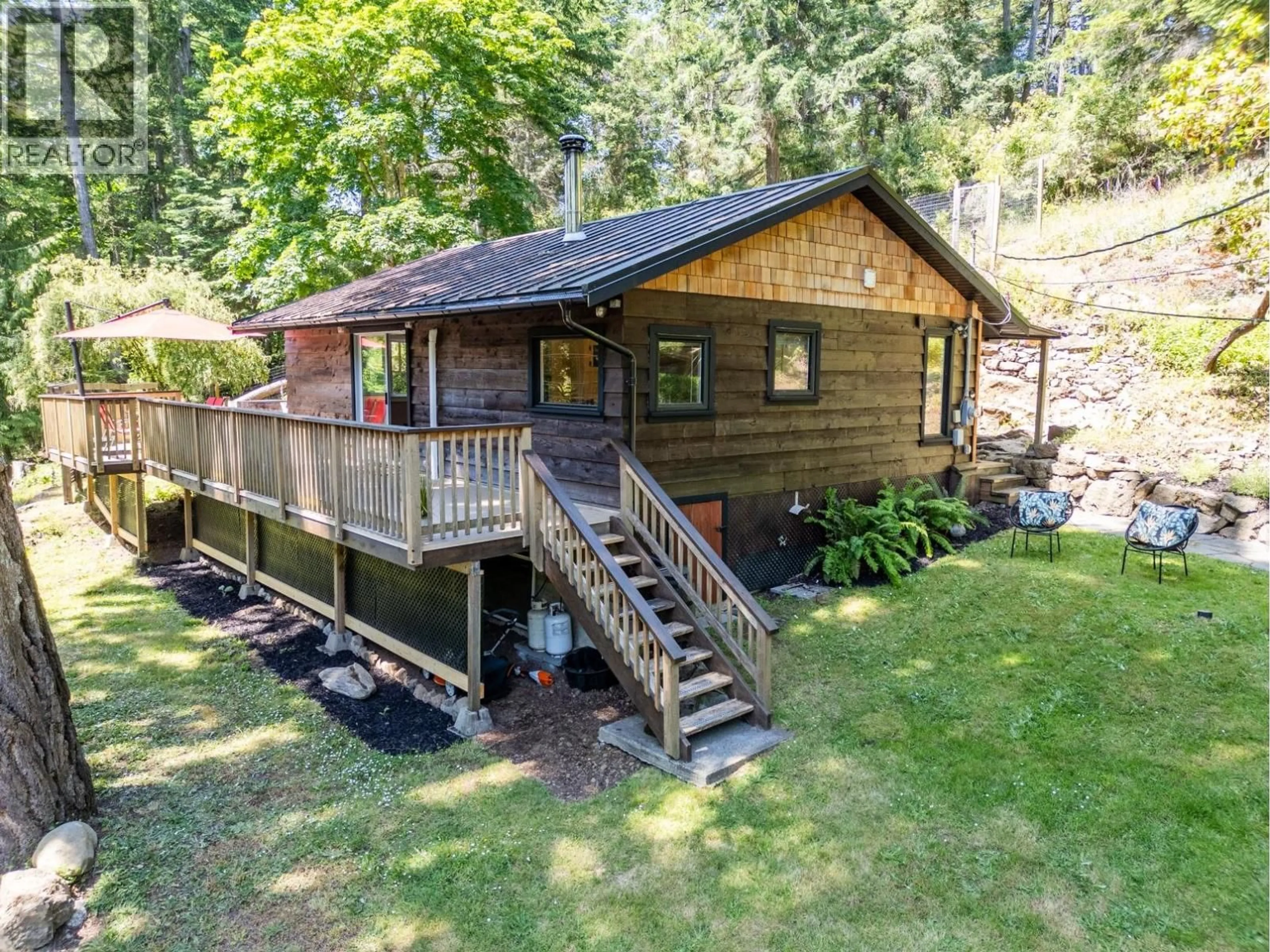 A pic from outside/outdoor area/front of a property/back of a property/a pic from drone, water/lake/river/ocean view for 9907 GOWLLAND POINT ROAD, Pender Island British Columbia V0N2M3