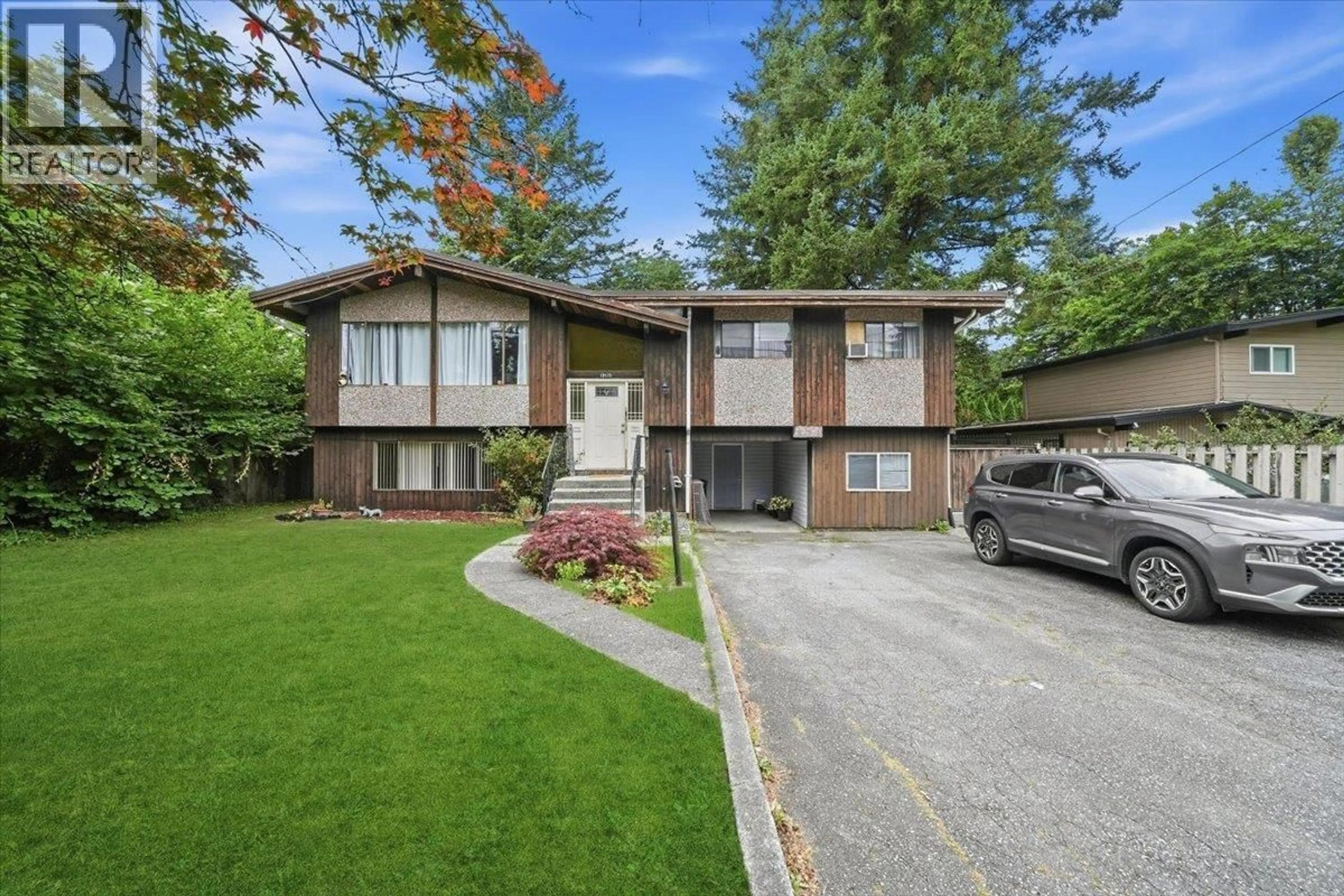 Home with vinyl exterior material, street for 19575 HAMMOND ROAD, Pitt Meadows British Columbia V3Y1L5