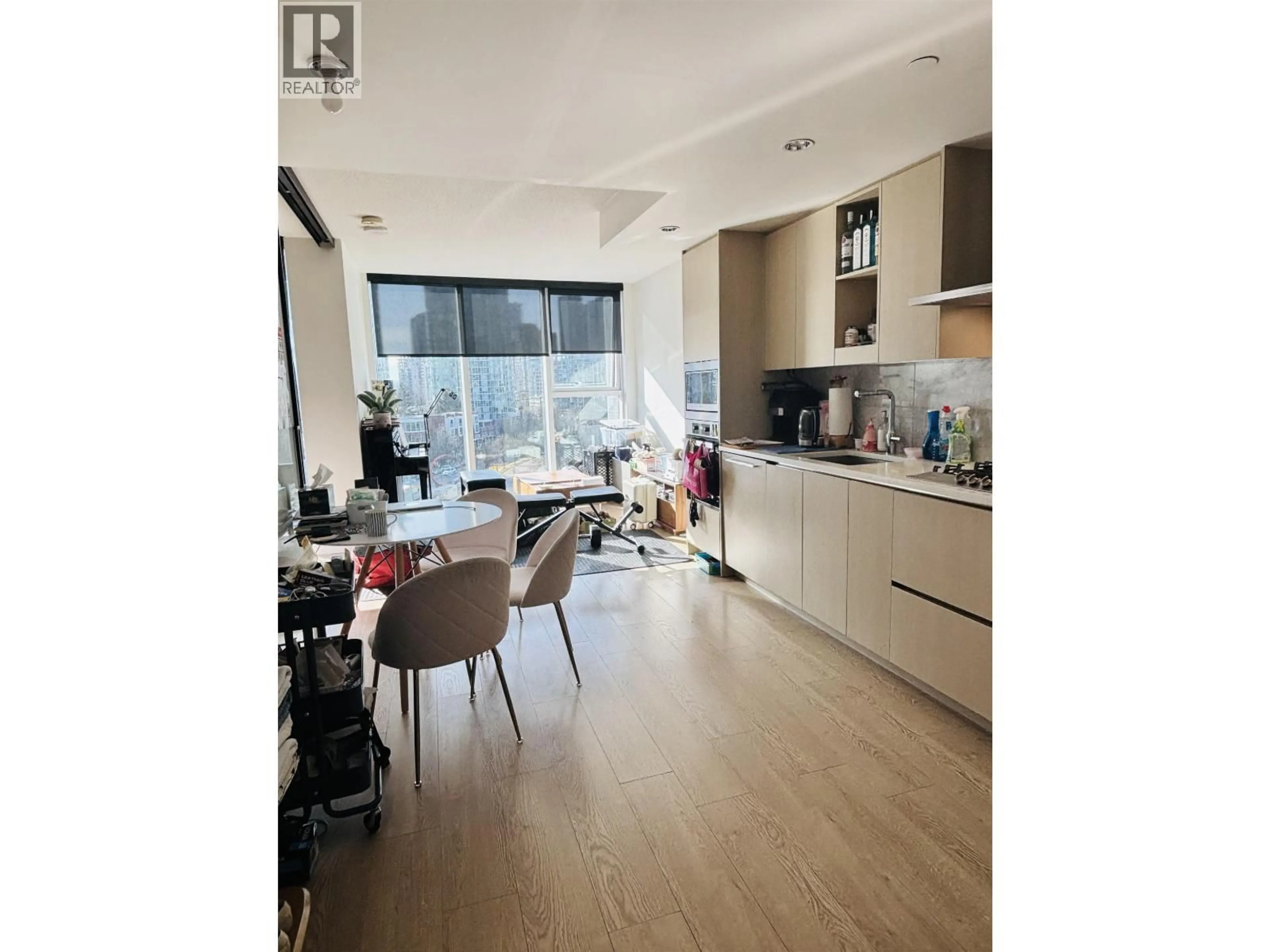 Open concept kitchen, wood/laminate floor for 886 - 87 NELSON STREET, Vancouver British Columbia V6Z0E8