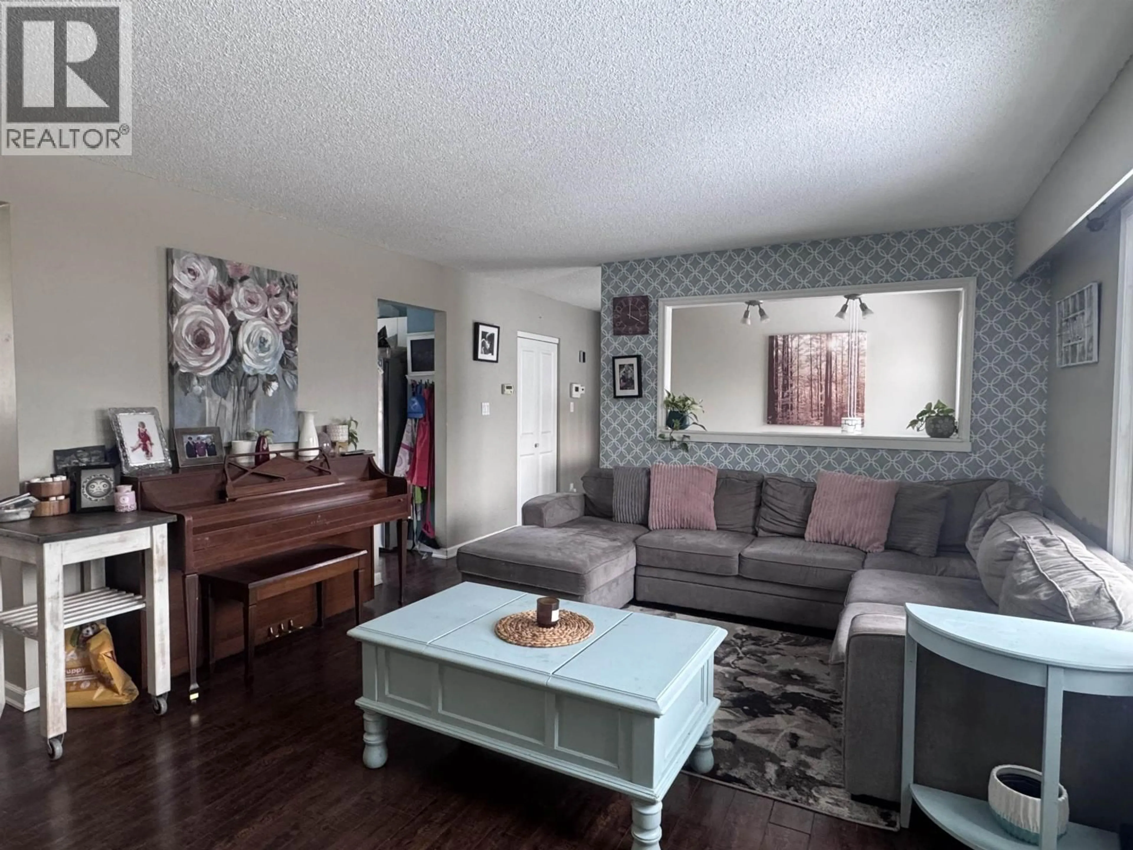 Living room with furniture, wood/laminate floor for 4705 MCCONNELL AVENUE, Terrace British Columbia V8G2G7