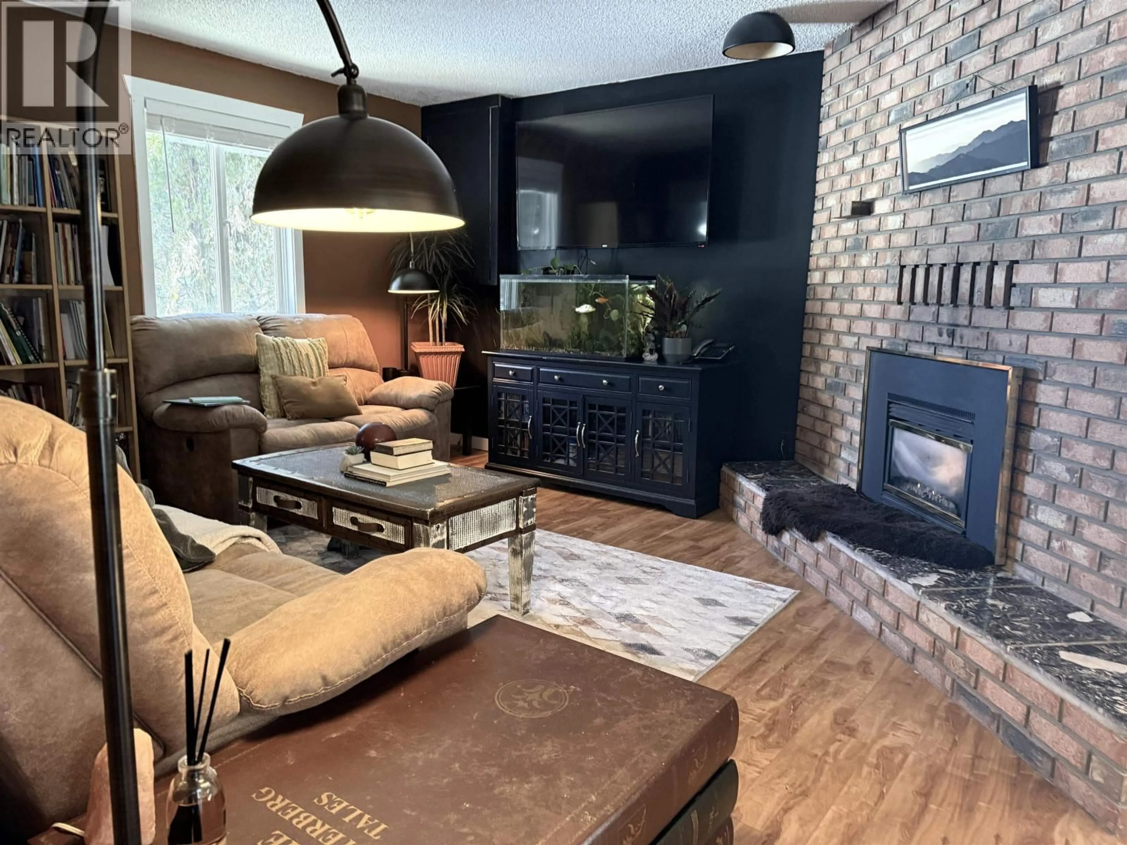 Living room with furniture, wood/laminate floor for 3065 WALLACE CRESCENT, Prince George British Columbia V2K3Y9