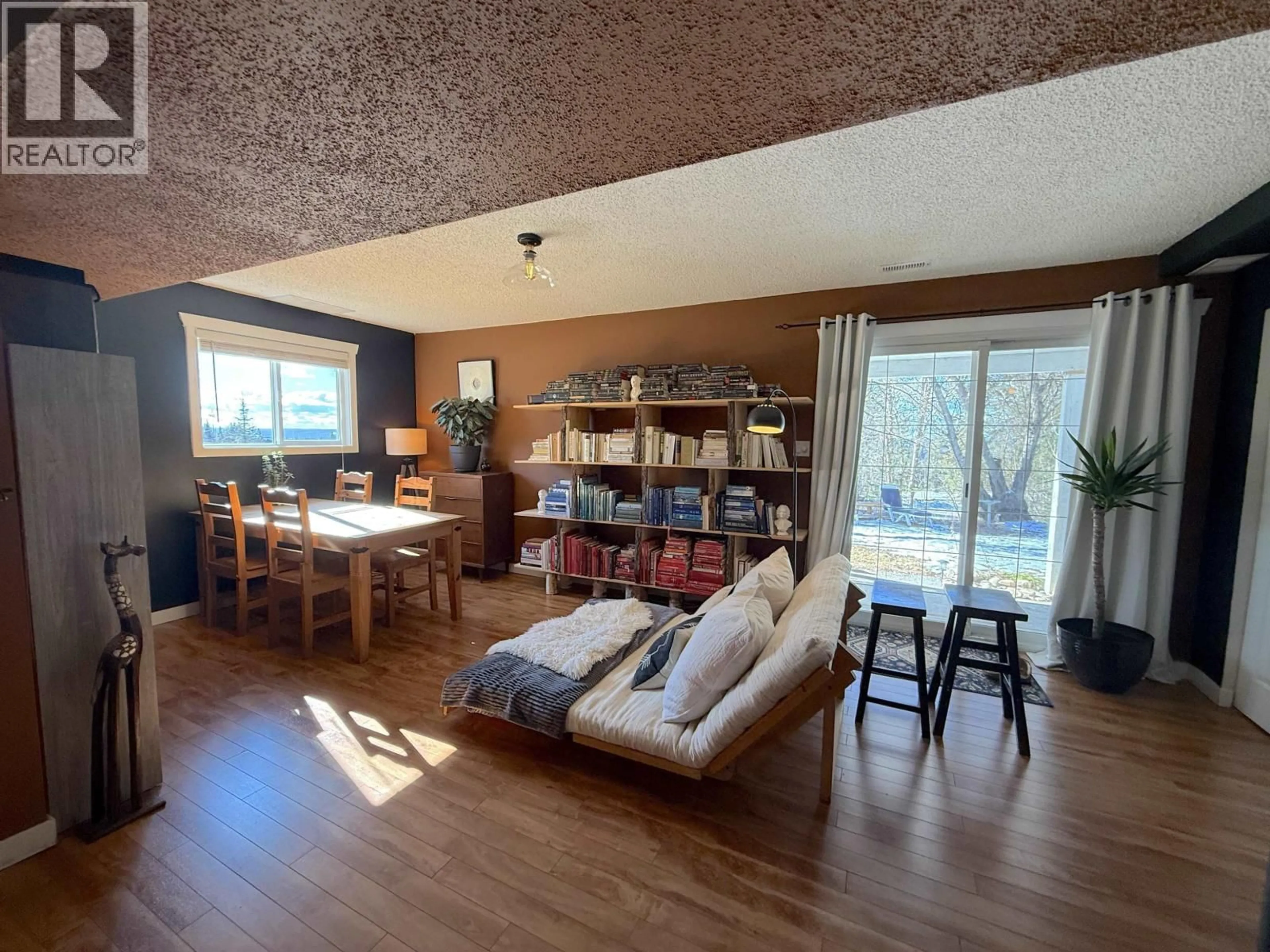 Living room with furniture, wood/laminate floor for 3065 WALLACE CRESCENT, Prince George British Columbia V2K3Y9
