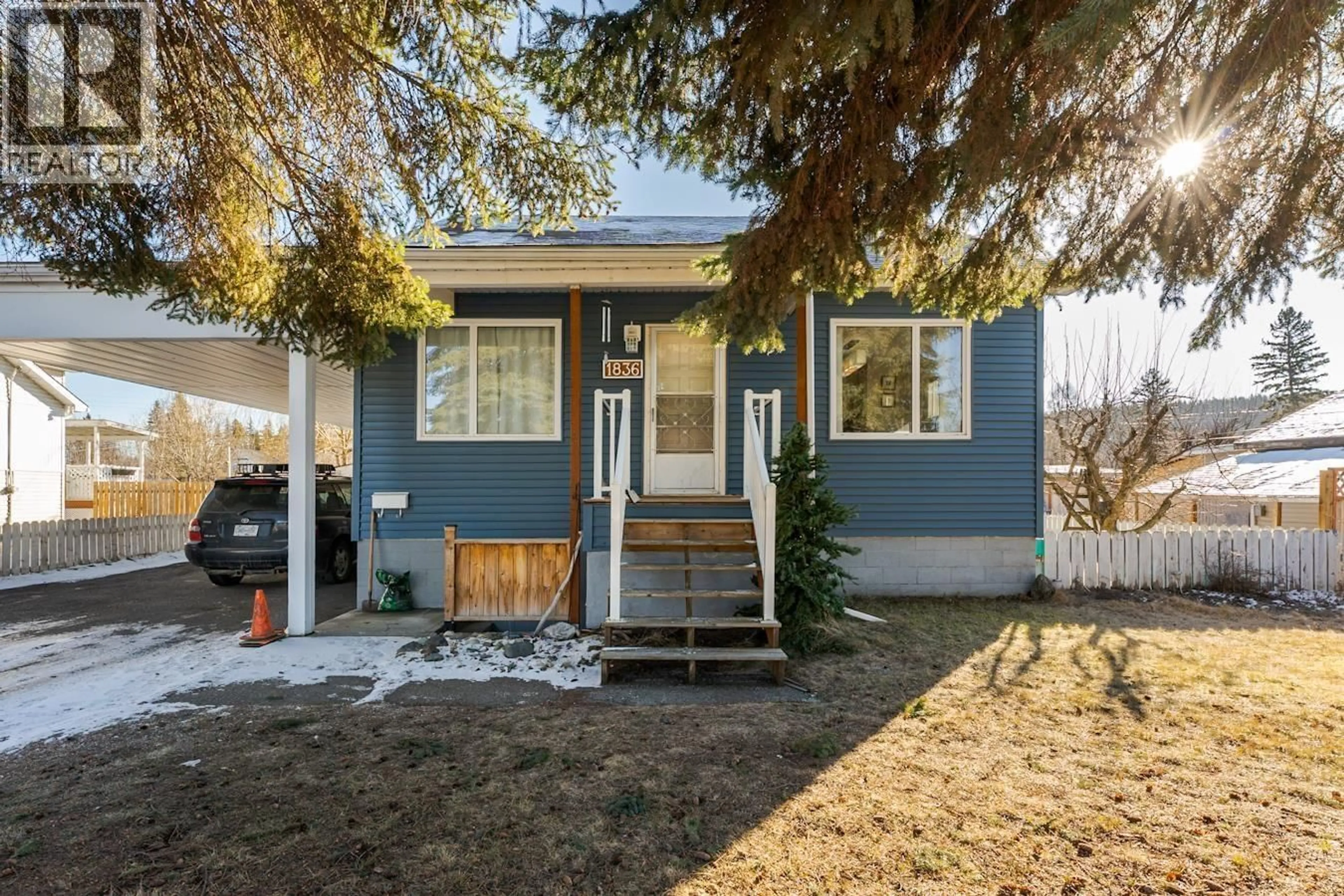 Home with vinyl exterior material, street for 1836 HEMLOCK STREET, Prince George British Columbia V2L1J2