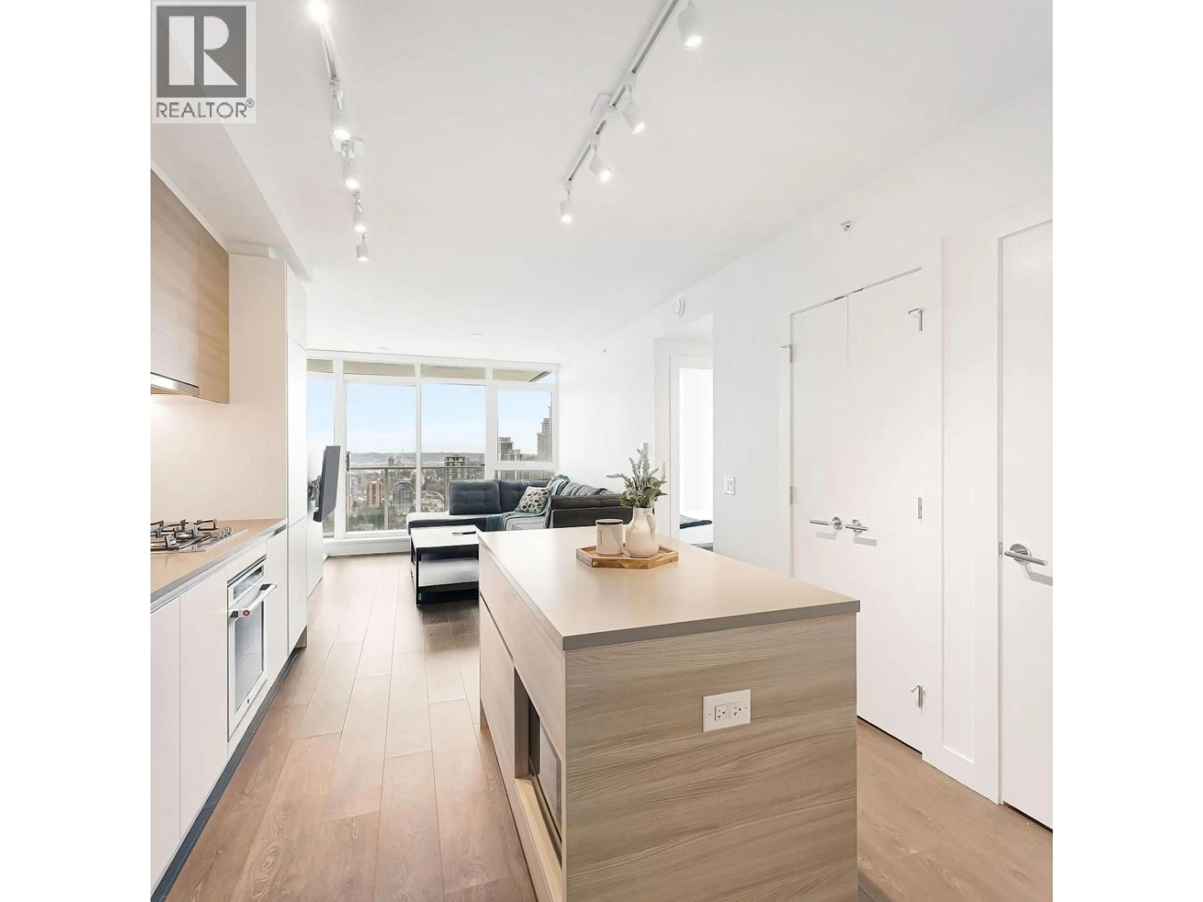 Open concept kitchen, wood/laminate floor for 2306 - 657 WHITING WAY, Coquitlam British Columbia V3J7W9