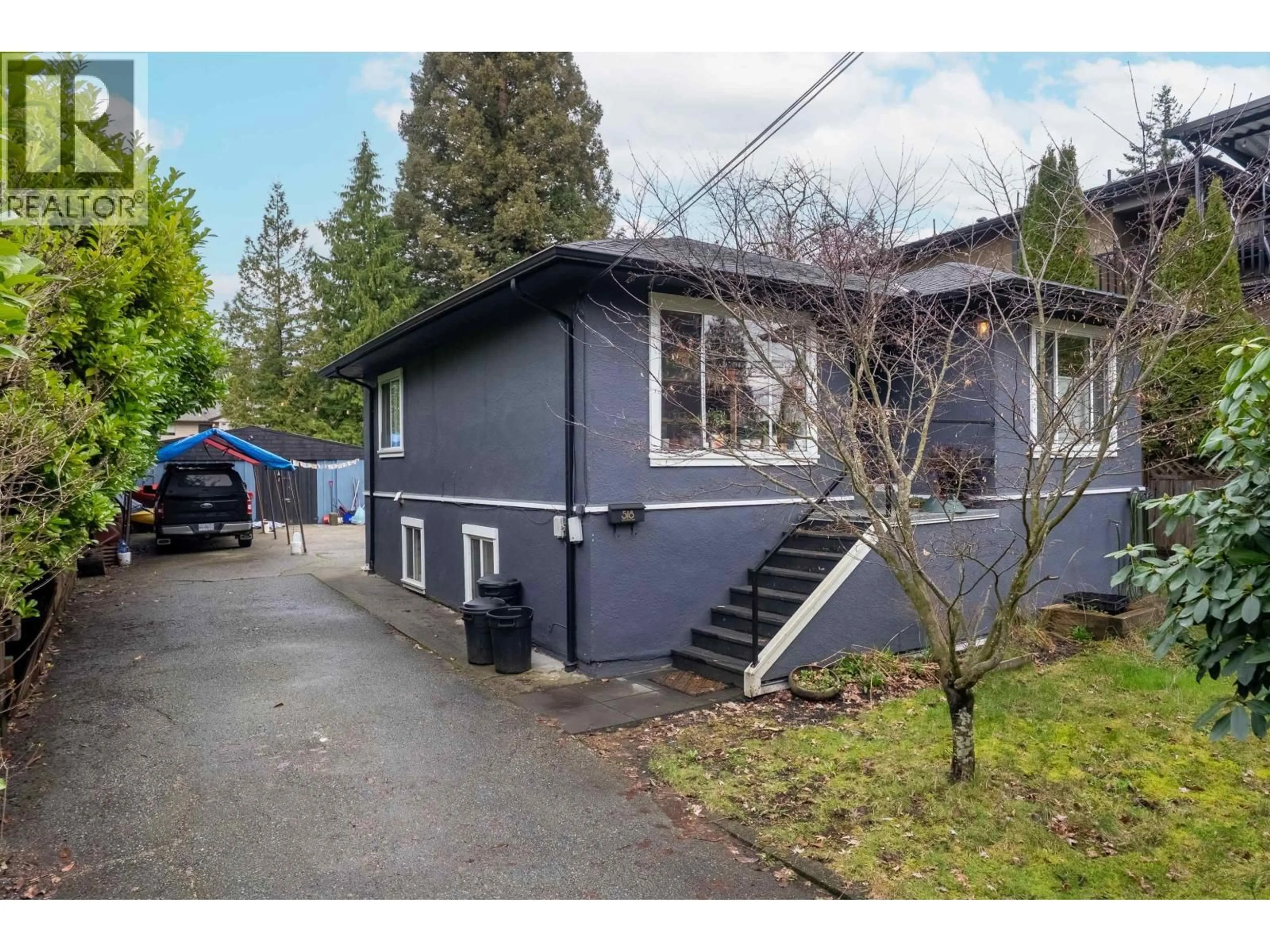Home with vinyl exterior material, street for 518 23RD STREET, North Vancouver British Columbia V7M2B9