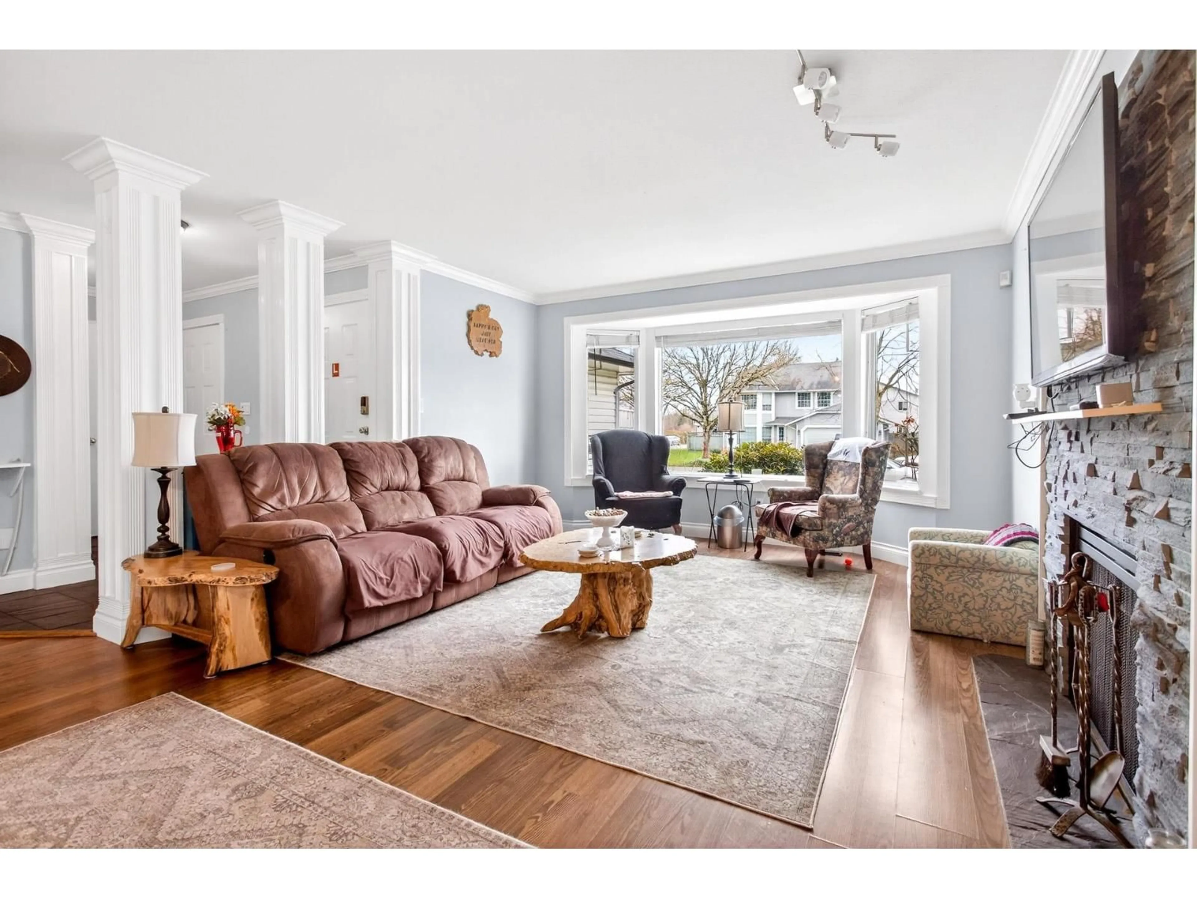 Living room with furniture, wood/laminate floor for 3273 264A STREET, Langley British Columbia V4W3E9