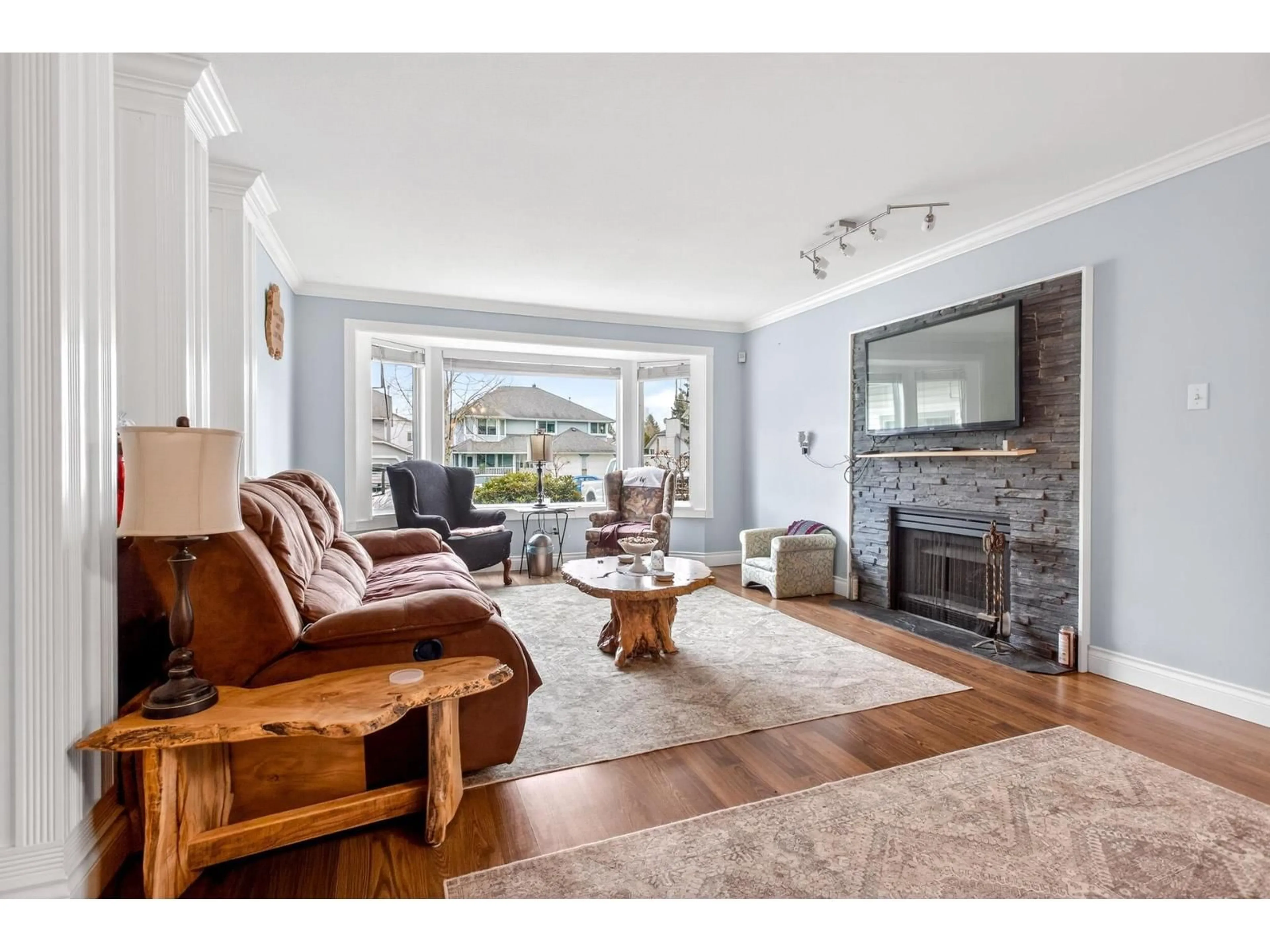Living room with furniture, wood/laminate floor for 3273 264A STREET, Langley British Columbia V4W3E9