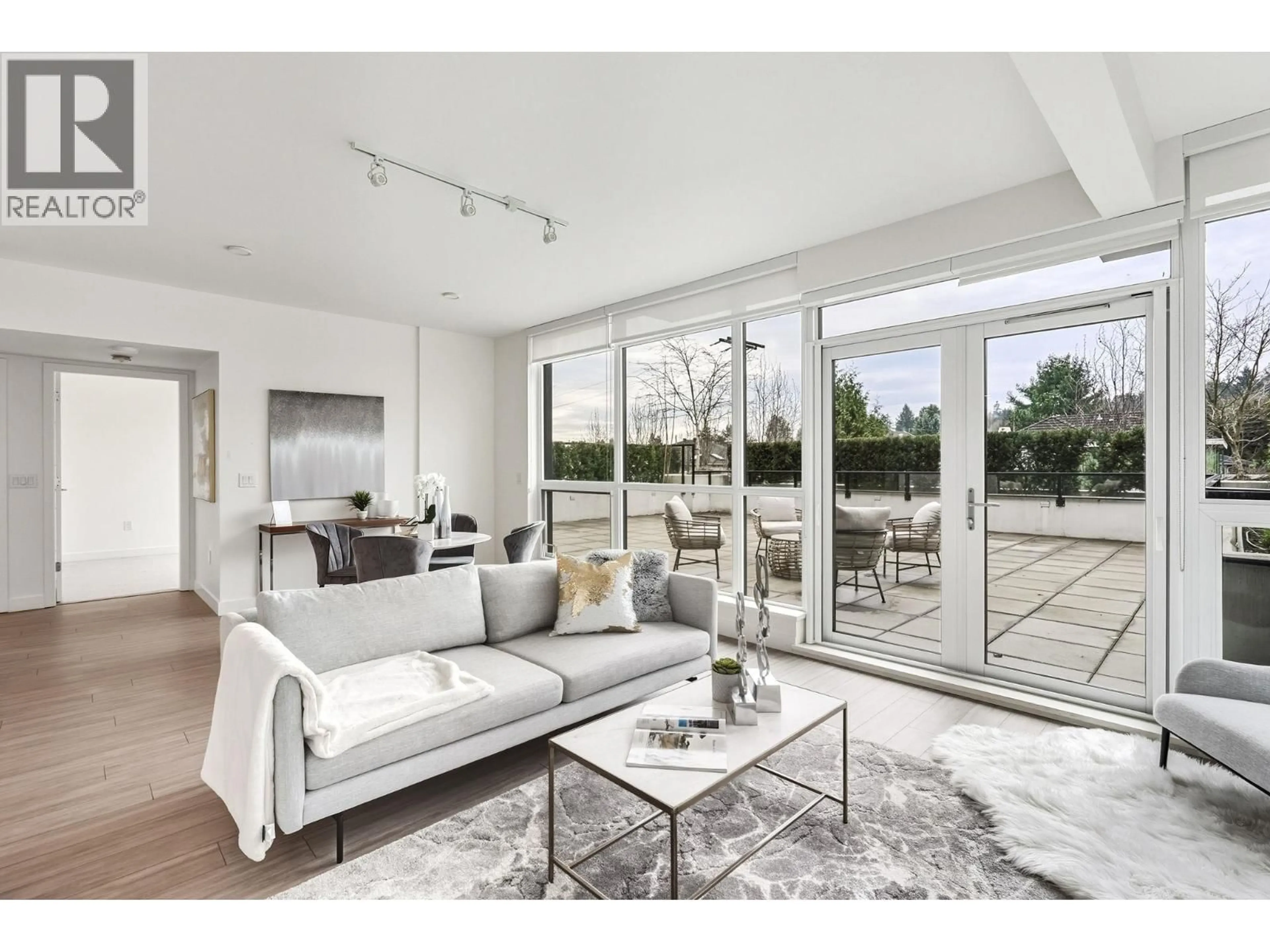 Living room with furniture, unknown for 372 - 438 KING EDWARD AVENUE, Vancouver British Columbia V5Y0M5