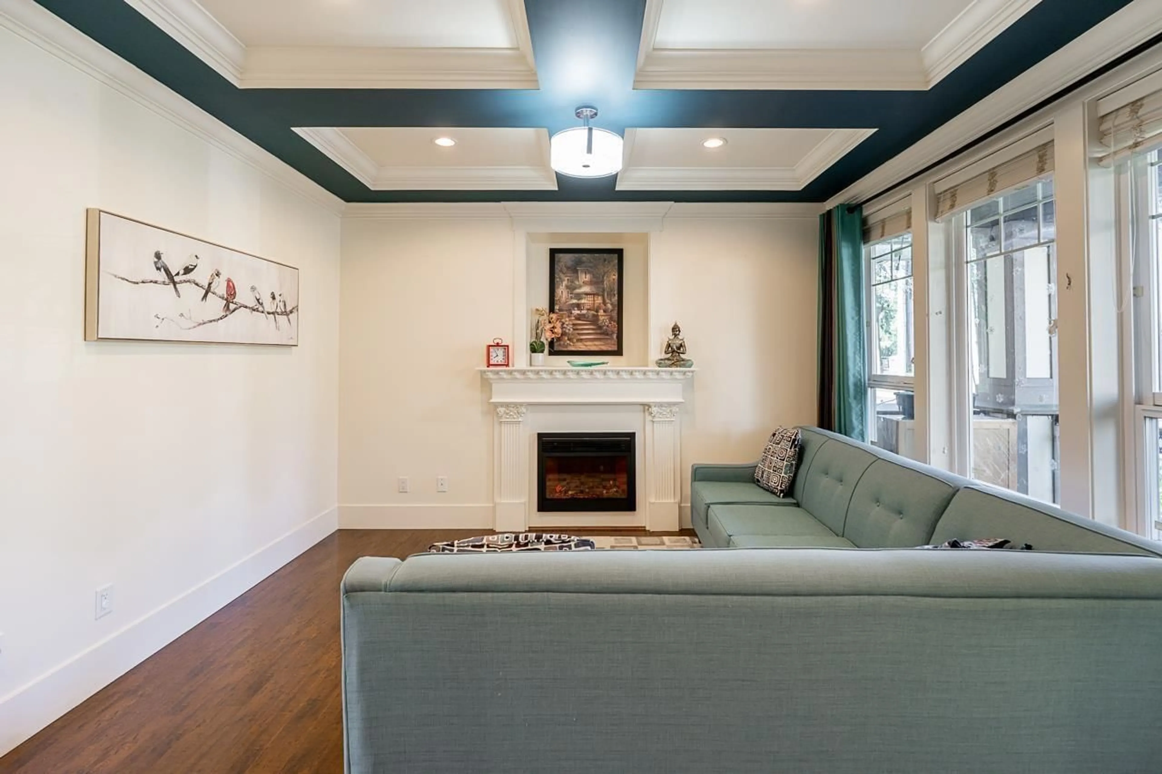 Living room with furniture, wood/laminate floor for 12920 60 AVENUE, Surrey British Columbia V3X2L5