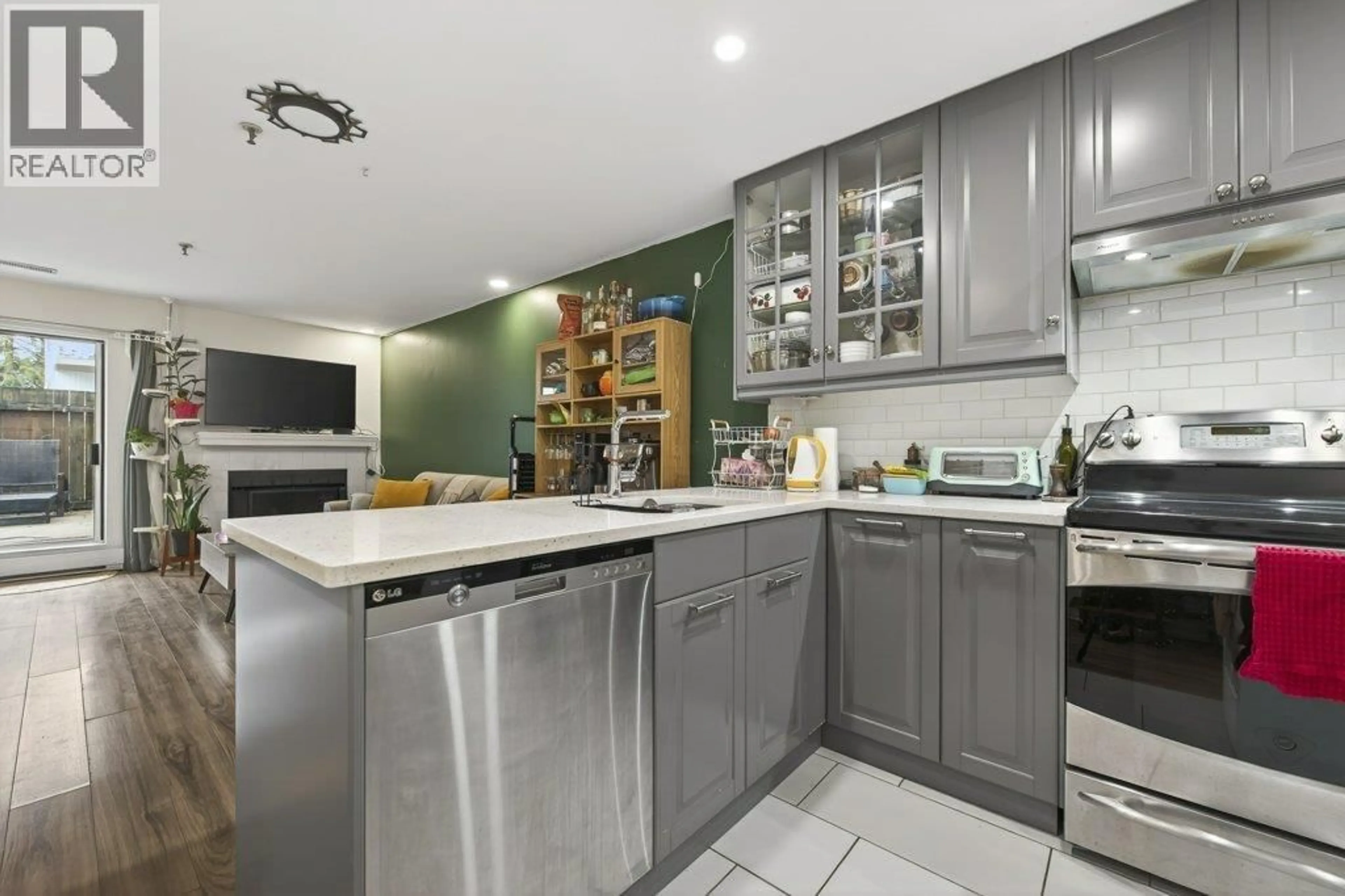 Contemporary kitchen, ceramic/tile floor for 103 - 2333 ETON STREET, Vancouver British Columbia V5L1E2