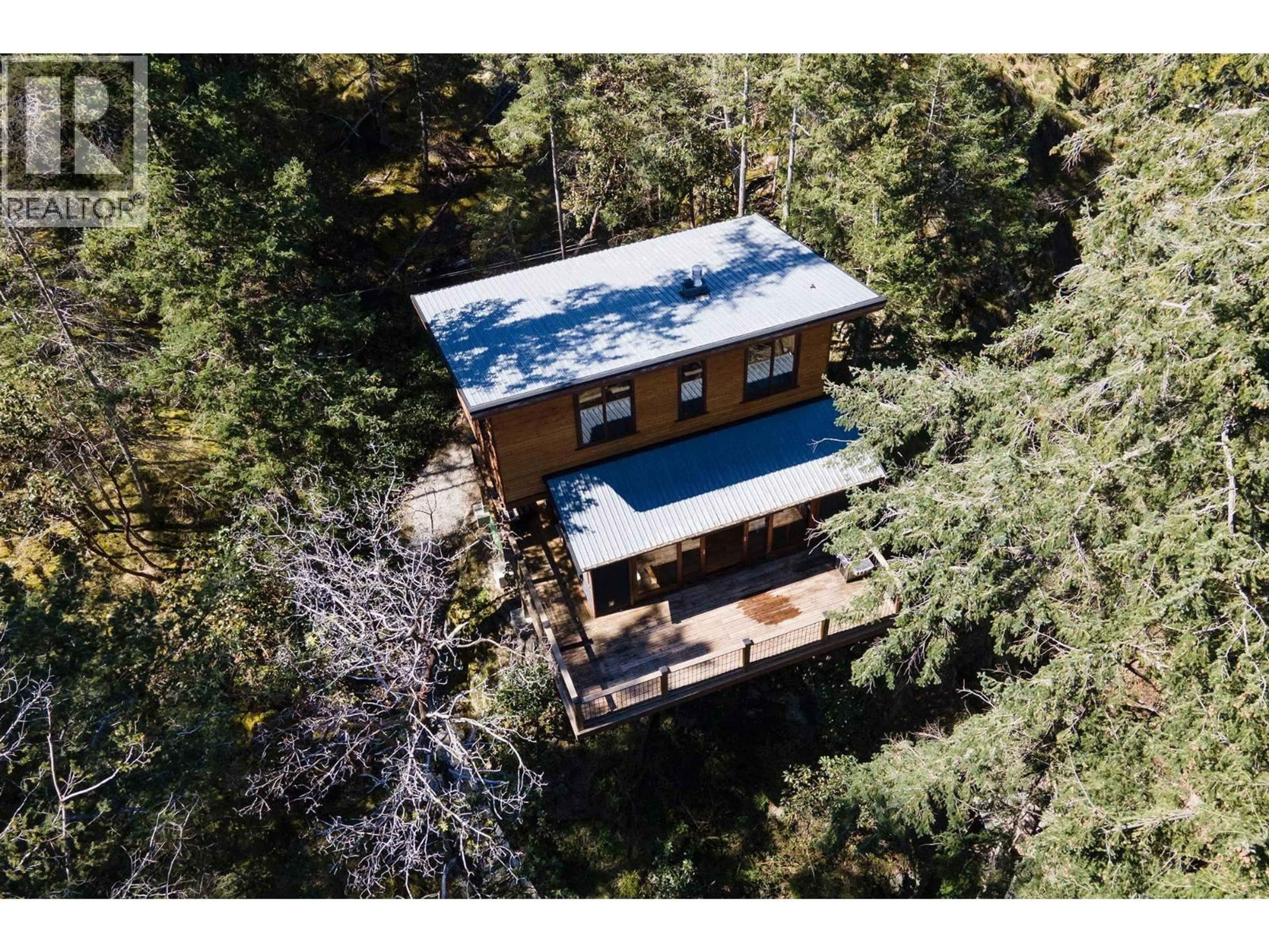A pic from outside/outdoor area/front of a property/back of a property/a pic from drone, forest/trees view for 5063 SHERMAN LANE, Halfmoon Bay British Columbia V7Z1G6