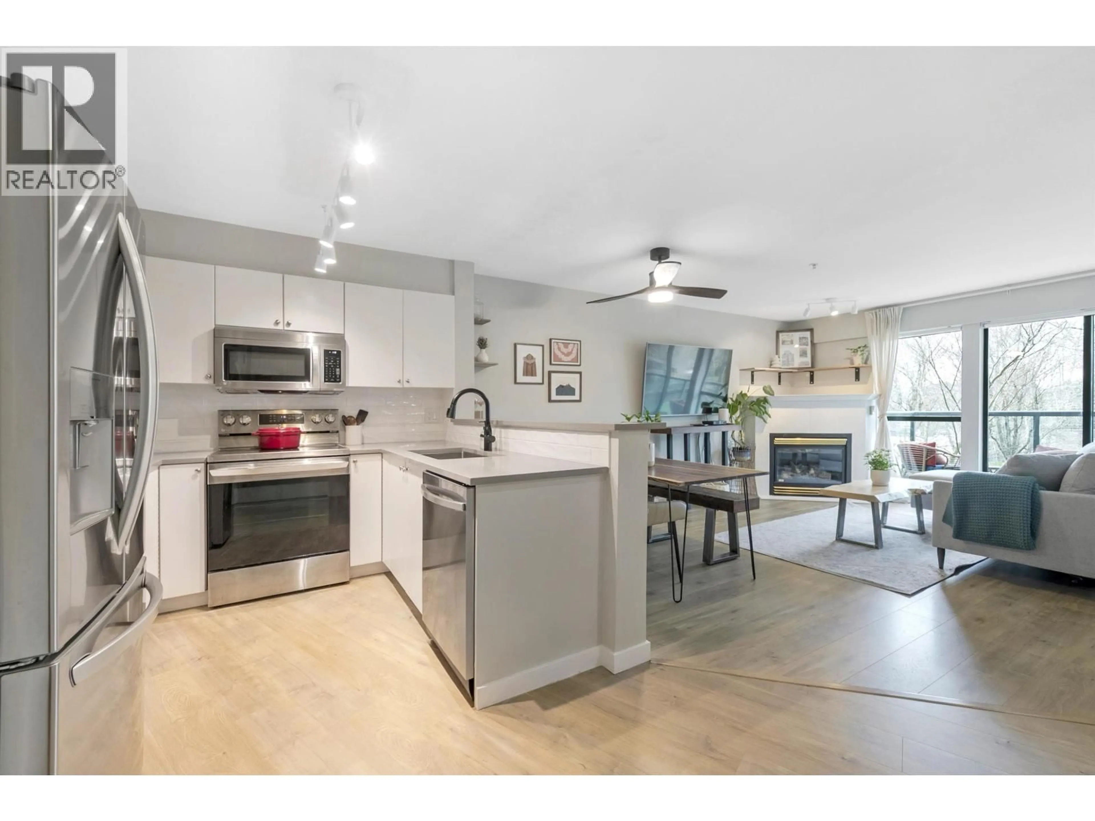 Open concept kitchen, ceramic/tile floor for 311 - 225 NEWPORT DRIVE, Port Moody British Columbia V3H5C7