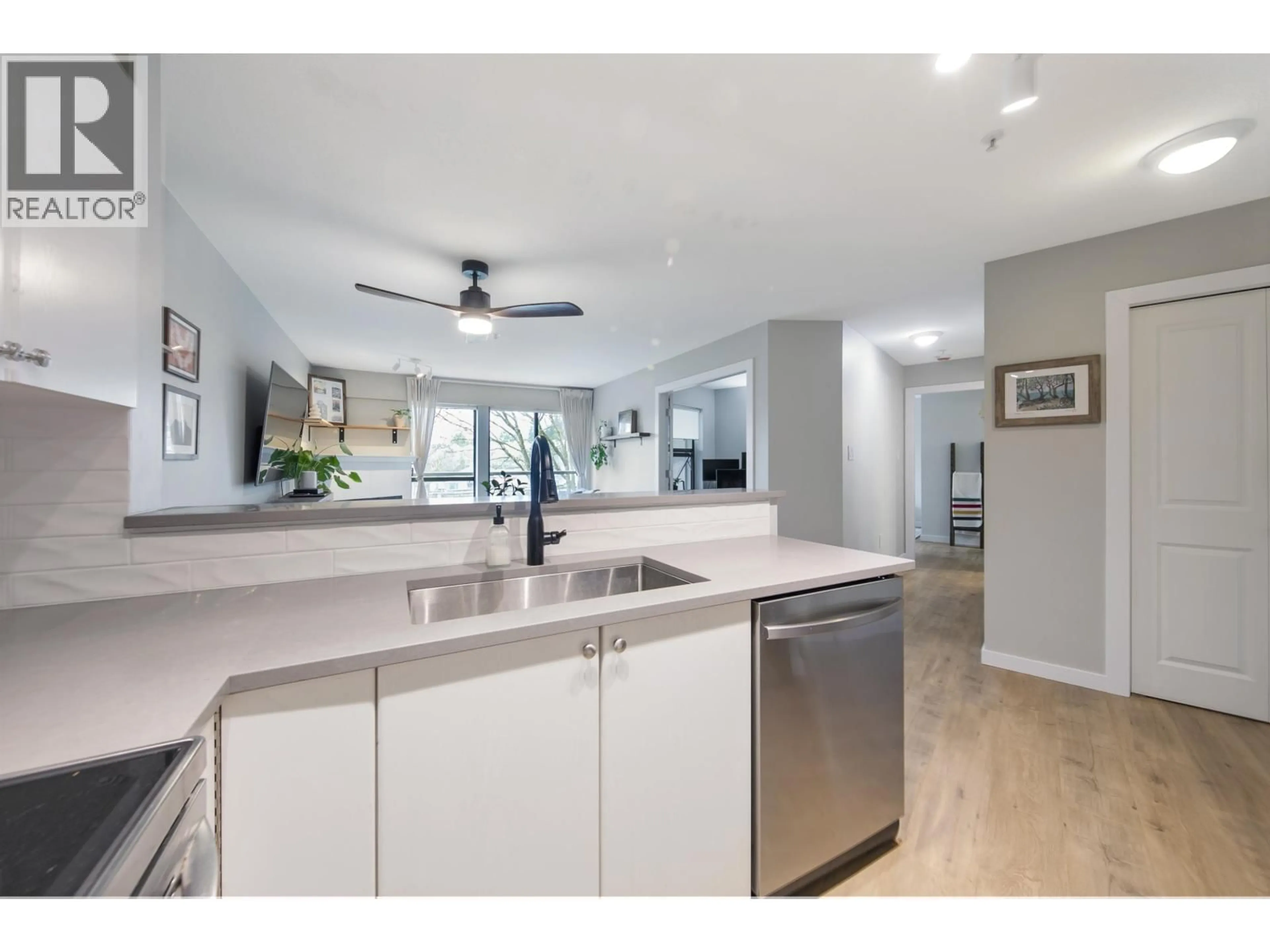 Open concept kitchen, ceramic/tile floor for 311 - 225 NEWPORT DRIVE, Port Moody British Columbia V3H5C7