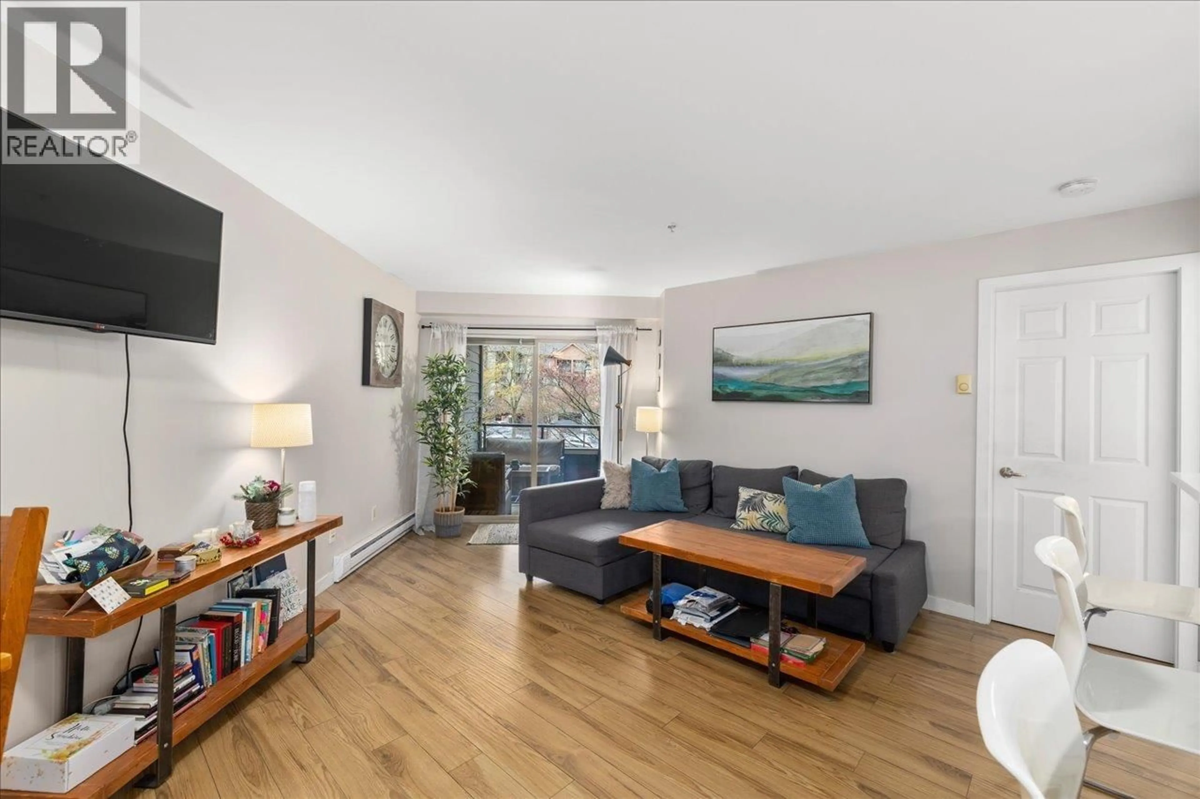 Living room with furniture, wood/laminate floor for 3220 - 240 SHERBROOKE STREET, New Westminster British Columbia V3L3M2