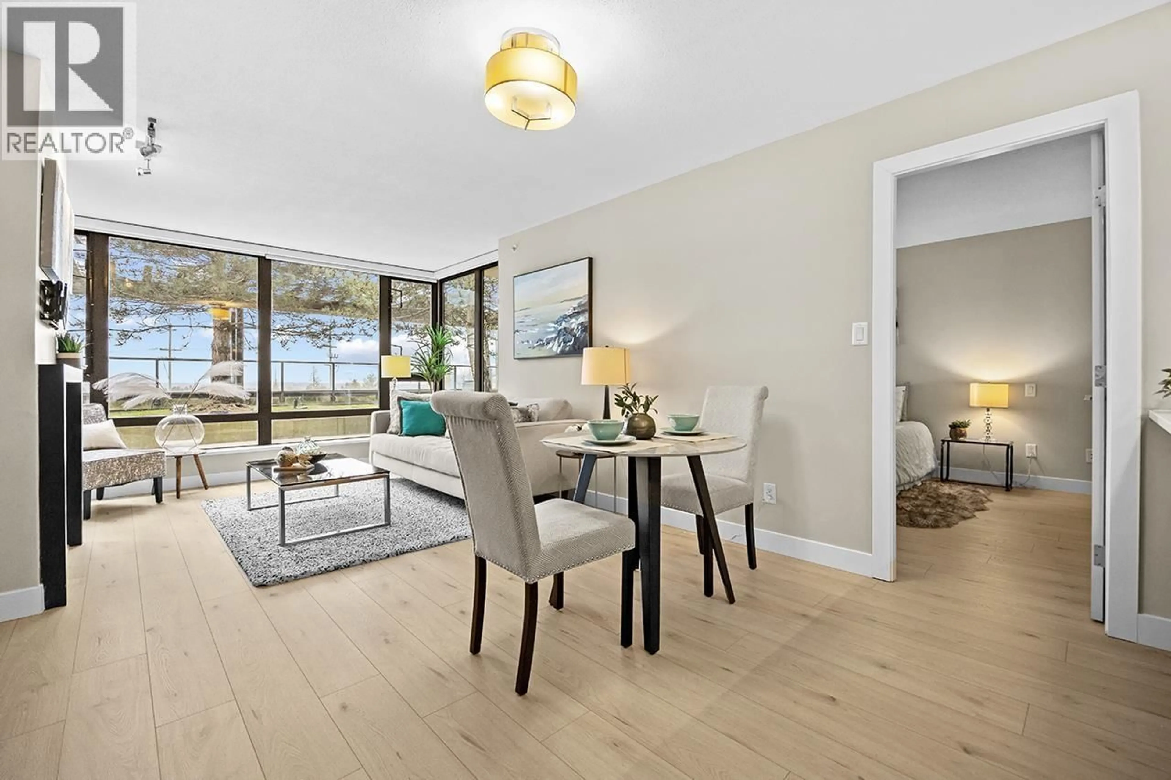 Dining room, wood/laminate floor for 303 - 7328 ARCOLA STREET, Burnaby British Columbia V5E0A7