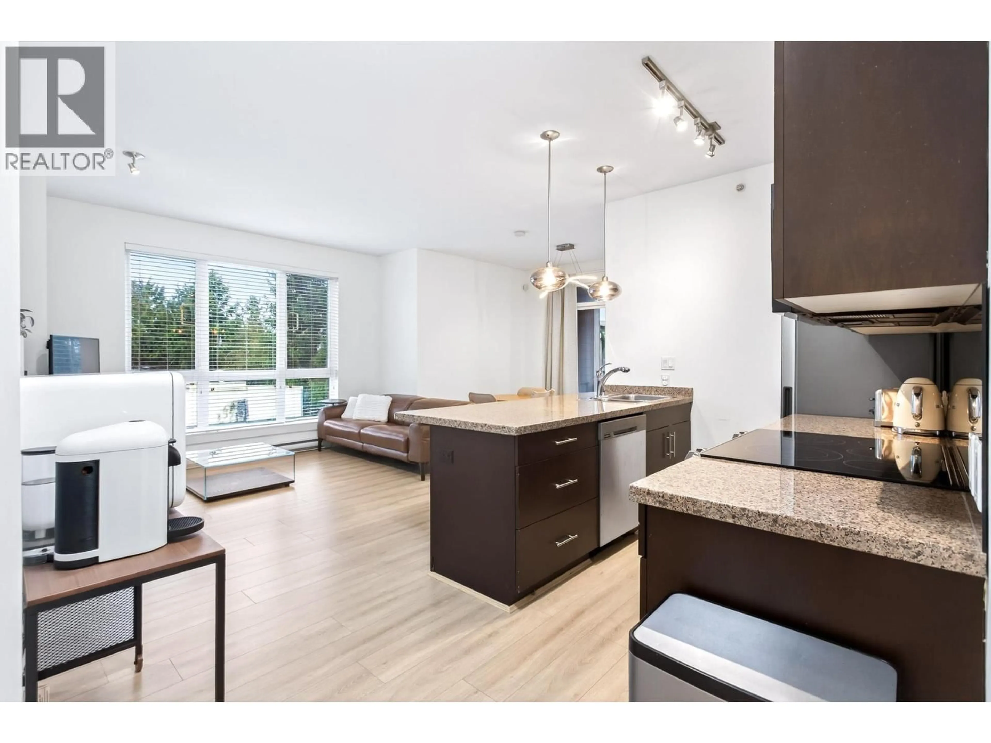 Open concept kitchen, wood/laminate floor for 301 - 8400 ANDERSON ROAD, Richmond British Columbia V6Y1S6