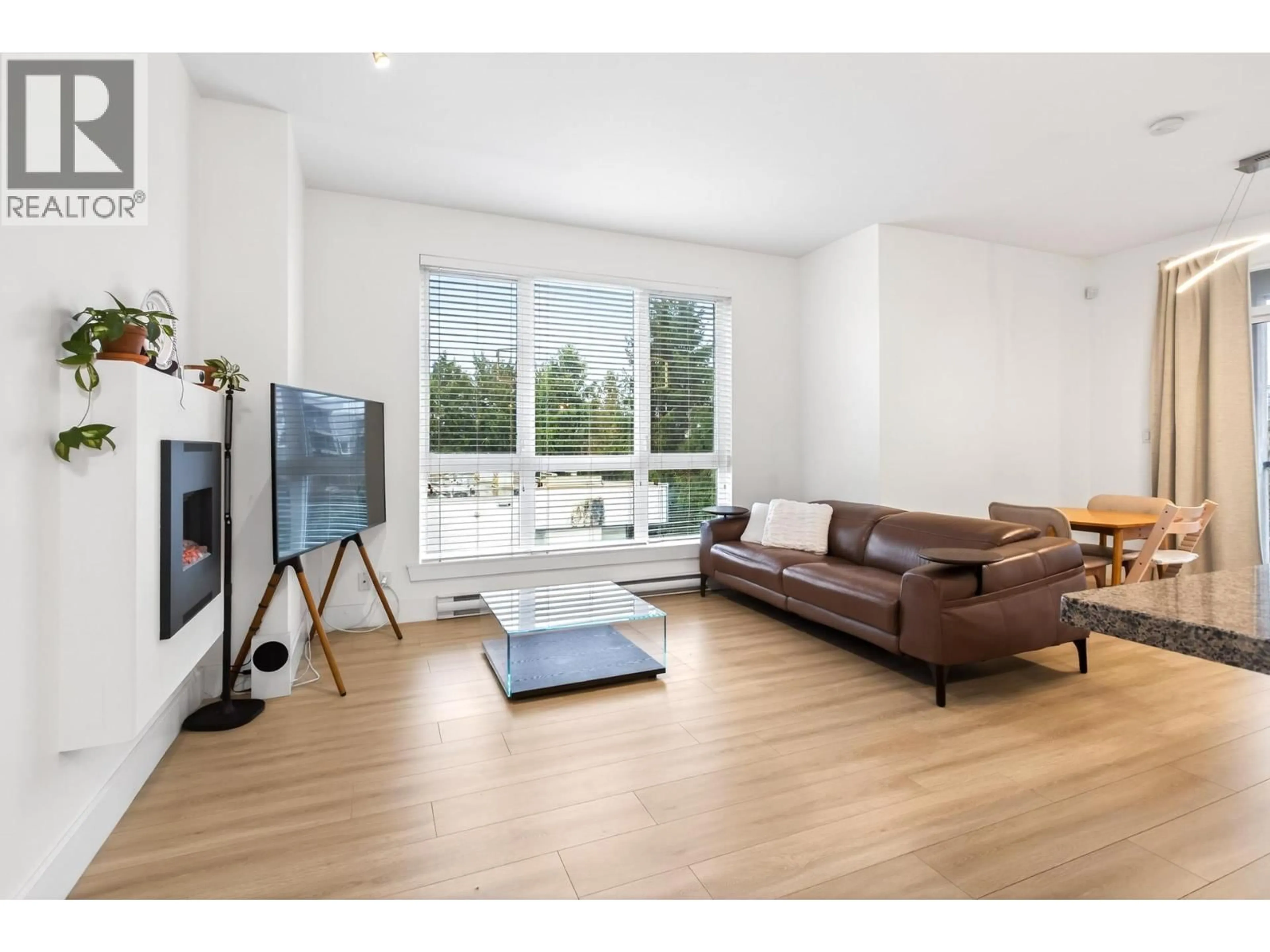 Living room with furniture, wood/laminate floor for 301 - 8400 ANDERSON ROAD, Richmond British Columbia V6Y1S6