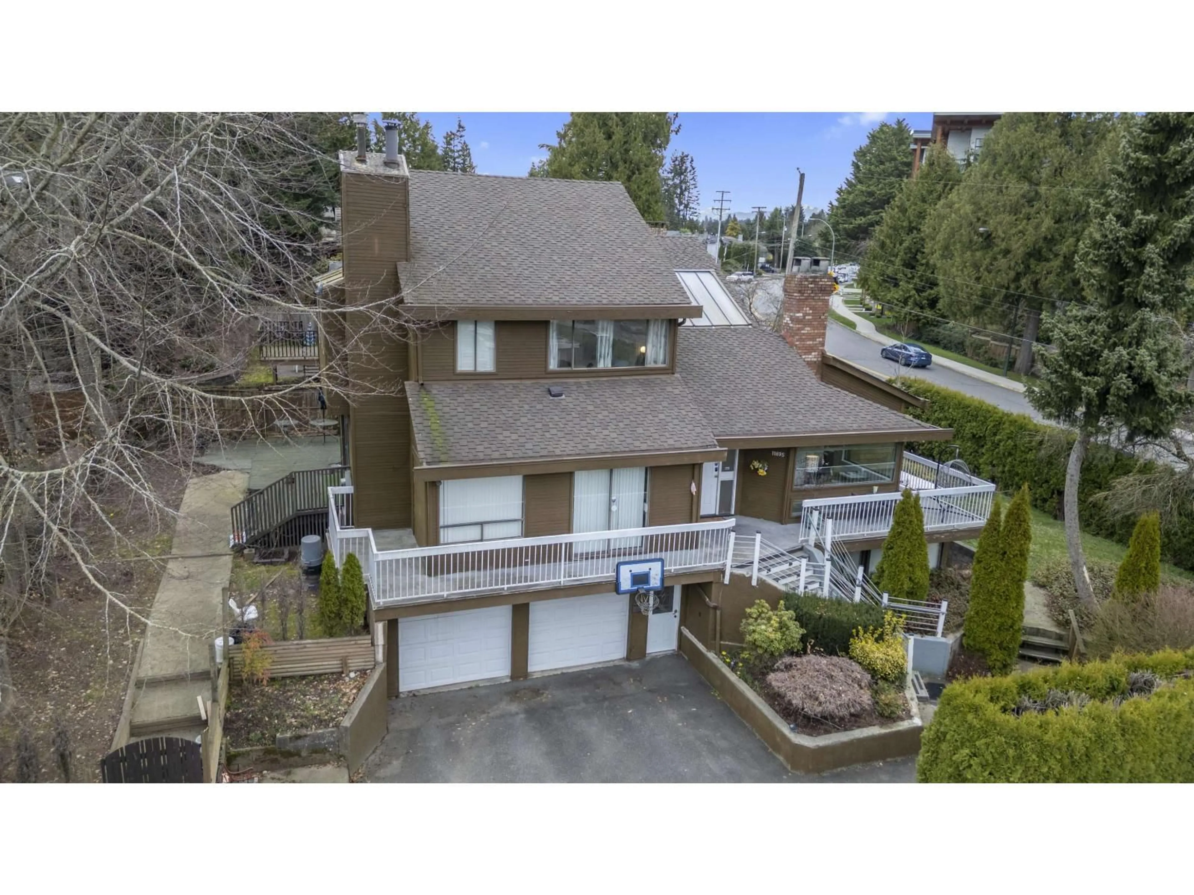 A pic from outside/outdoor area/front of a property/back of a property/a pic from drone, street for 11895 CHATEAU WYND, Delta British Columbia V4E3C7