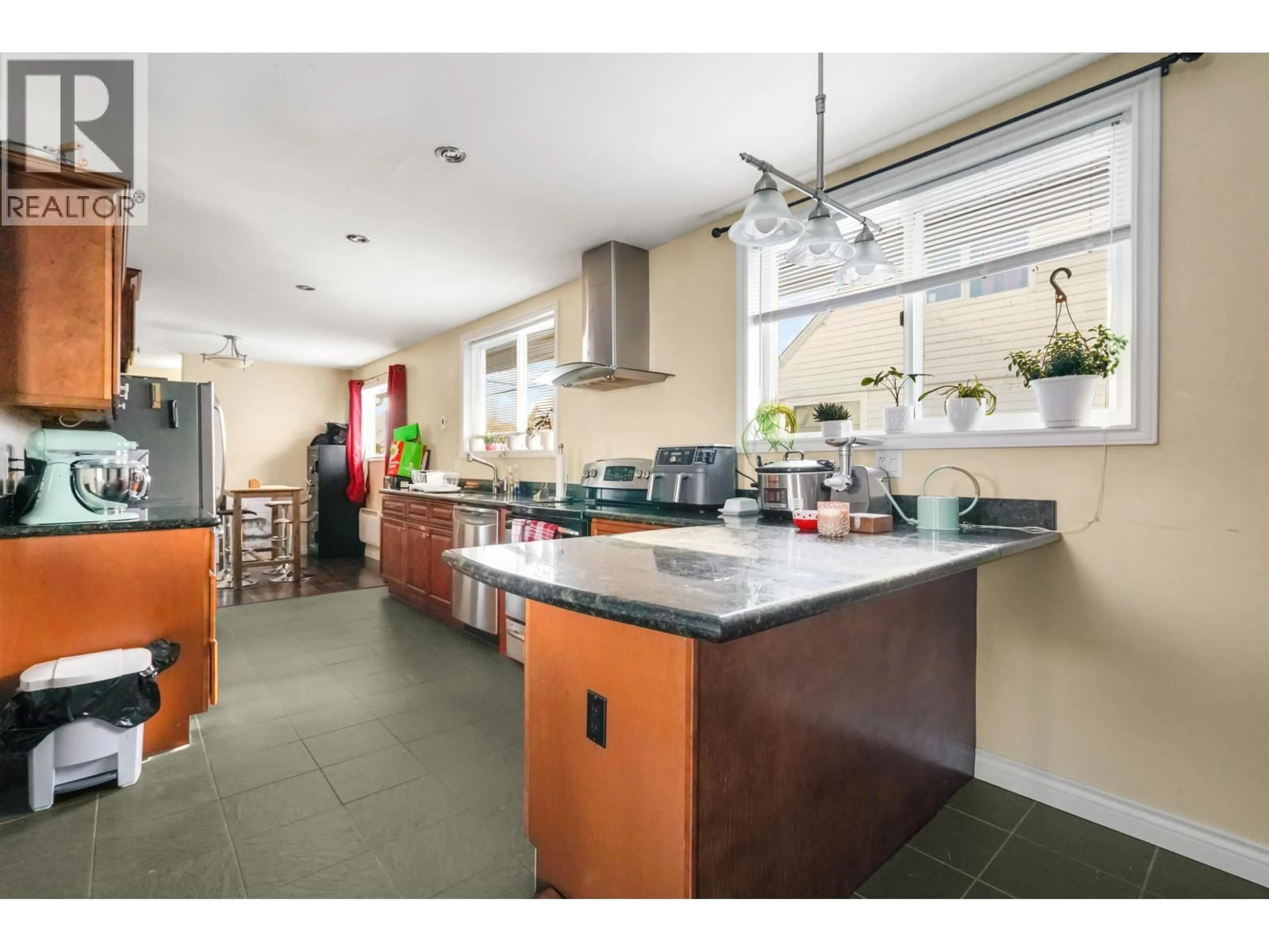 Open concept kitchen, ceramic/tile floor for 11 SWALLOW STREET, Kitimat British Columbia V8C1K6