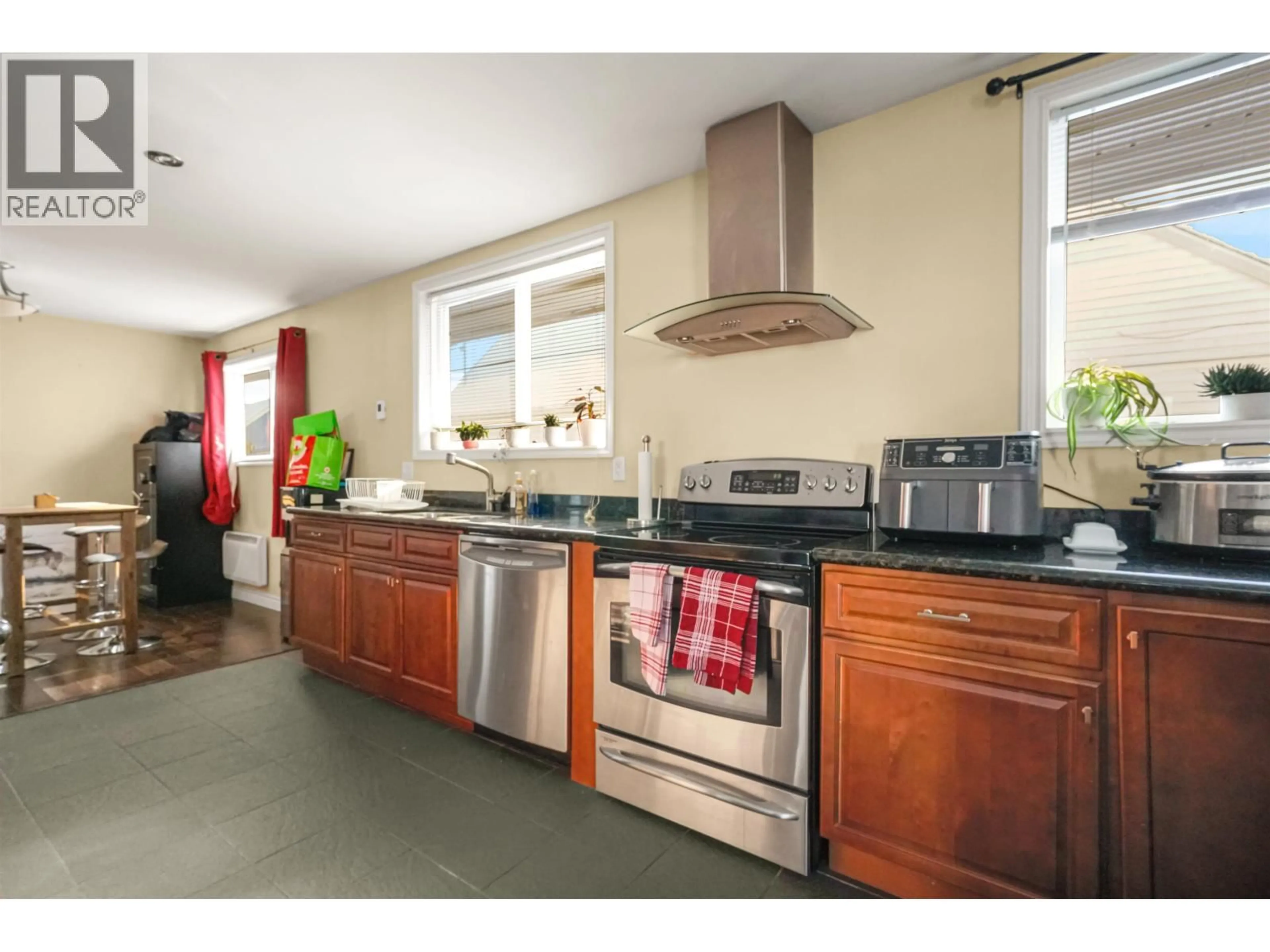 Standard kitchen, ceramic/tile floor for 11 SWALLOW STREET, Kitimat British Columbia V8C1K6