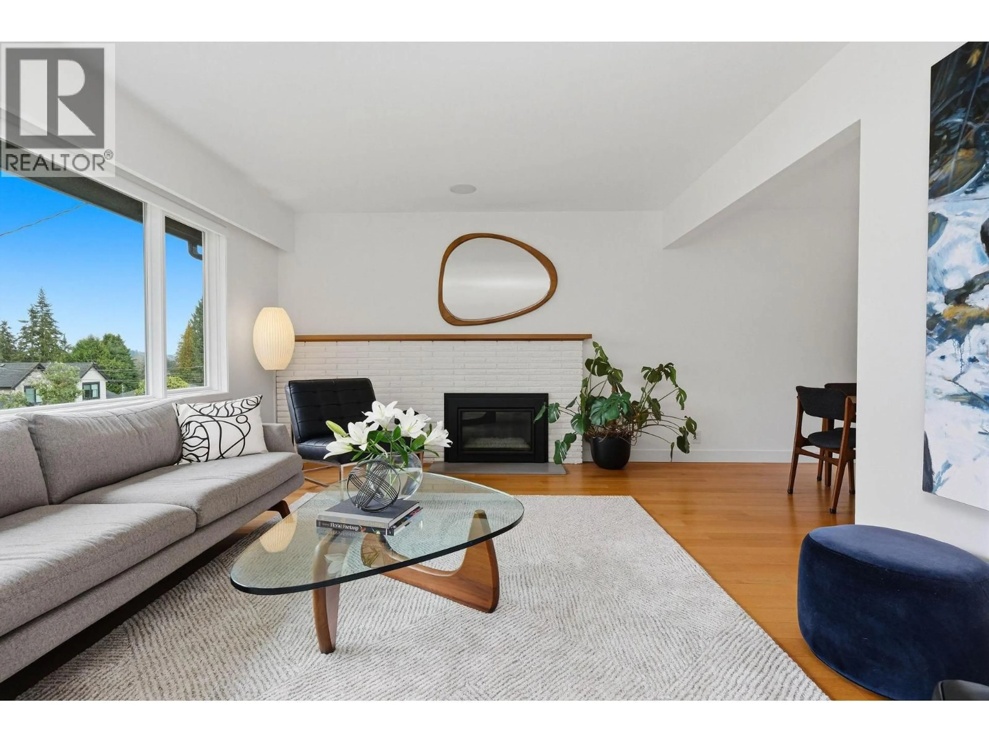Living room with furniture, wood/laminate floor for 2223 GREYLYNN CRESCENT, North Vancouver British Columbia V7J2X6