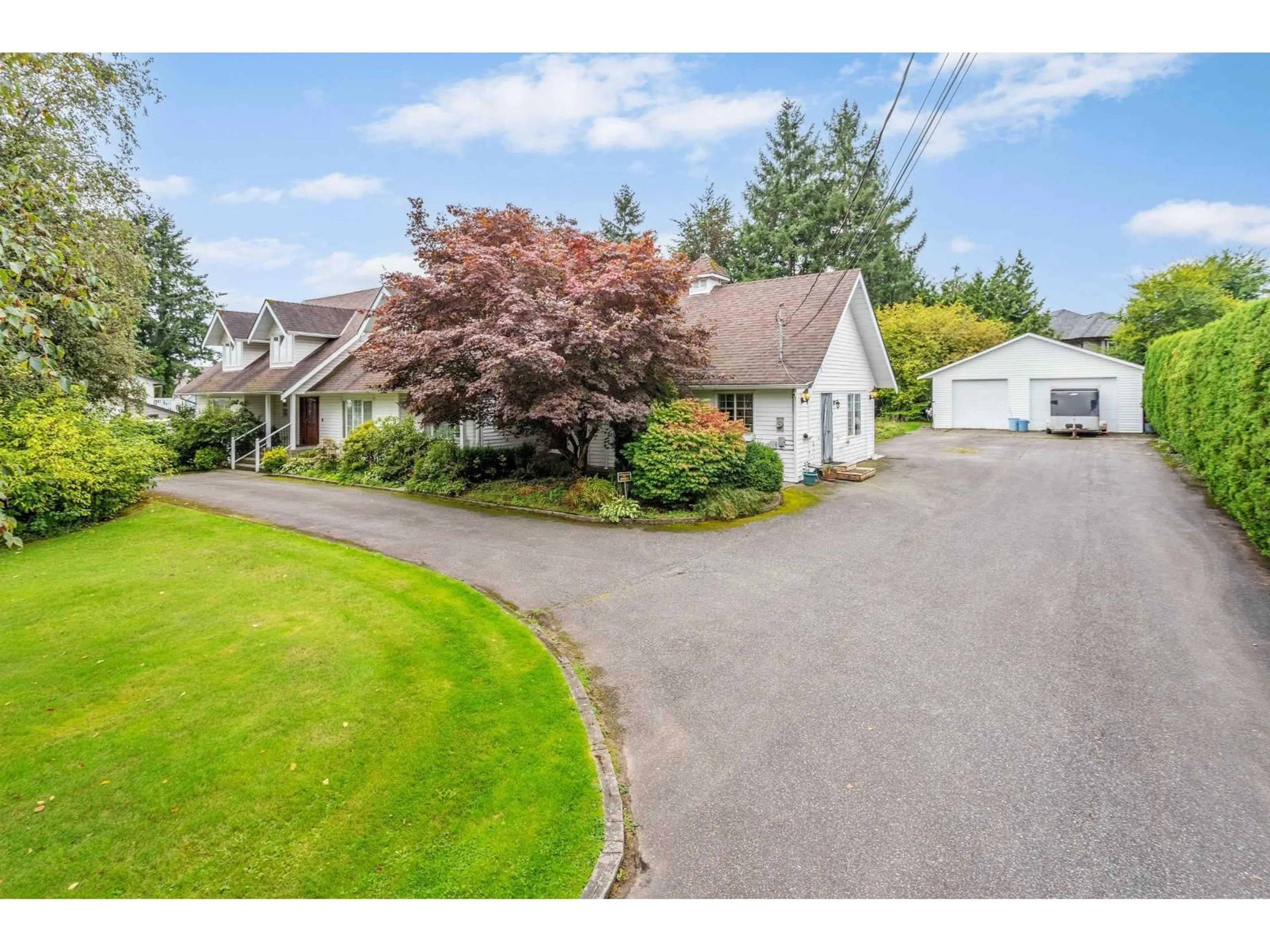 A pic from outside/outdoor area/front of a property/back of a property/a pic from drone, street for 7081 197B STREET, Langley British Columbia V2Y1R5