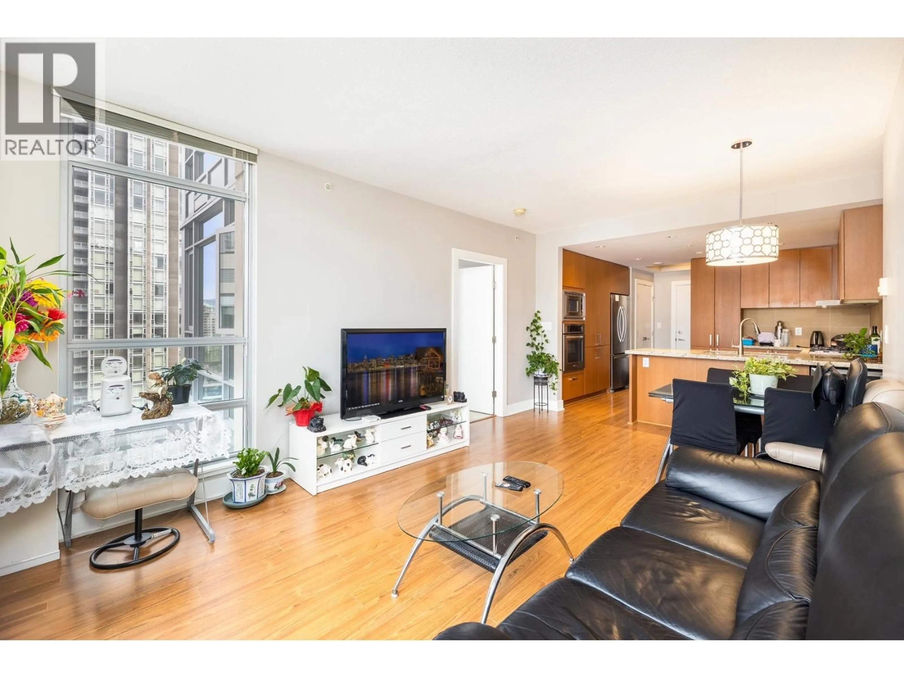 Living room with furniture, wood/laminate floor for 2206 - 1155 THE HIGH STREET, Coquitlam British Columbia V3B7W4