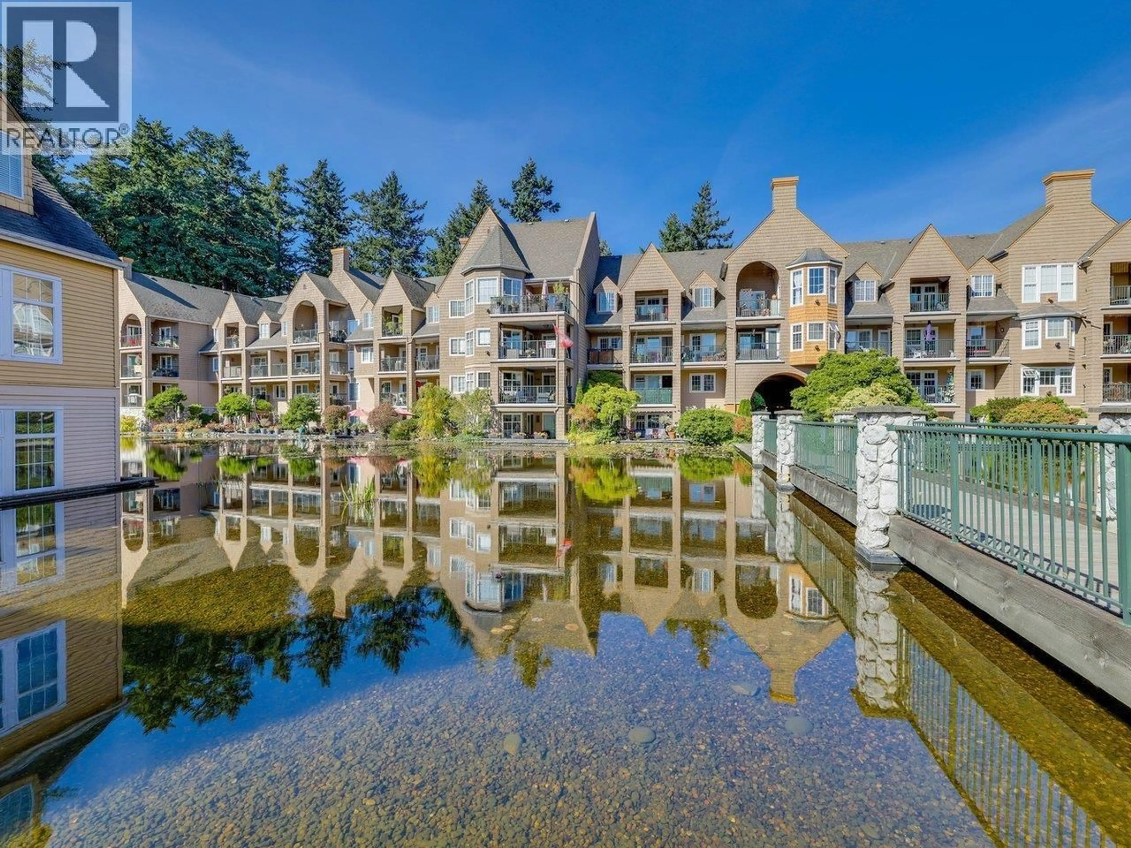 A pic from outside/outdoor area/front of a property/back of a property/a pic from drone, water/lake/river/ocean view for 409 - 5518 14 AVENUE, Delta British Columbia V4M4E9