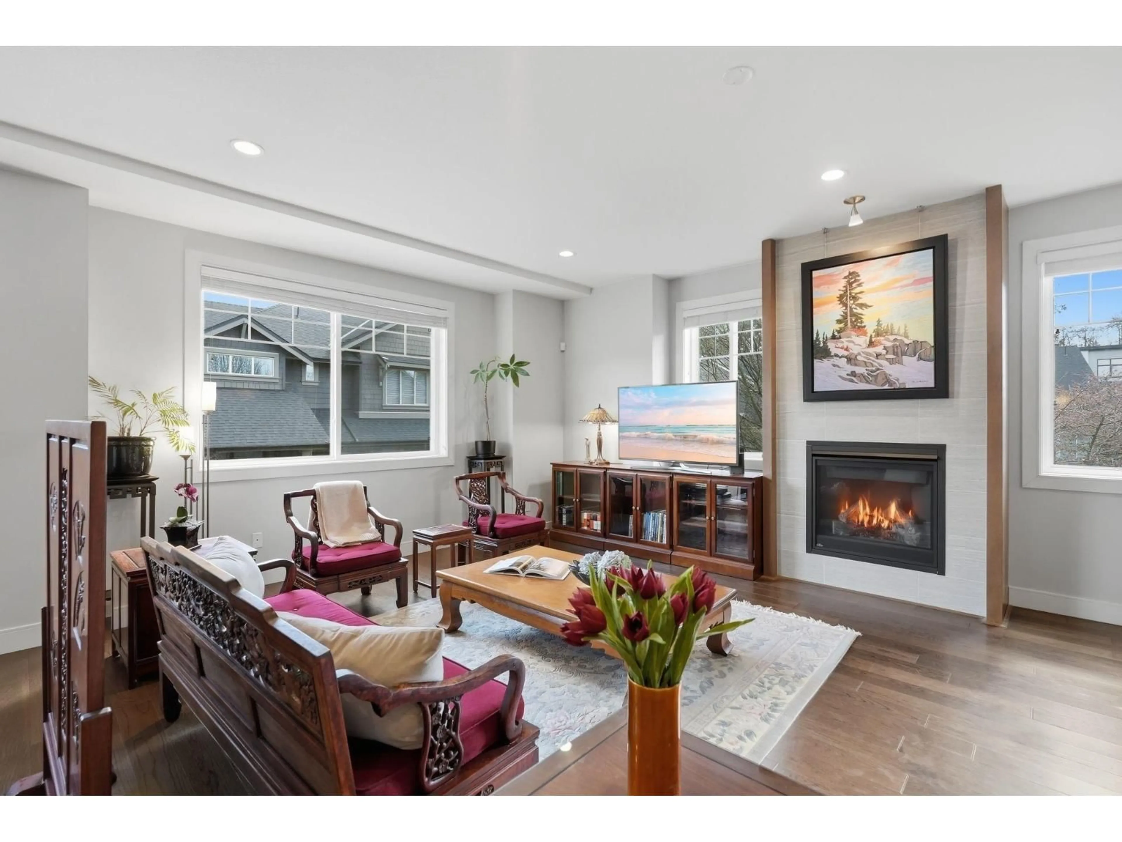 Living room with furniture, wood/laminate floor for 65 - 15988 32 AVENUE, Surrey British Columbia V3Z2J4