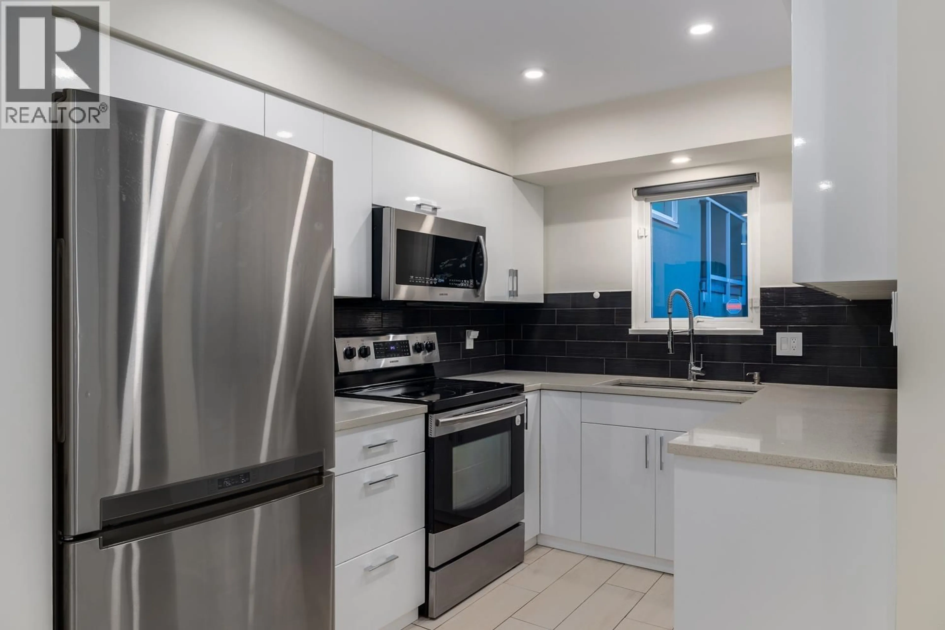 Standard kitchen, ceramic/tile floor for 2391 OAK STREET, Vancouver British Columbia V6H2J8