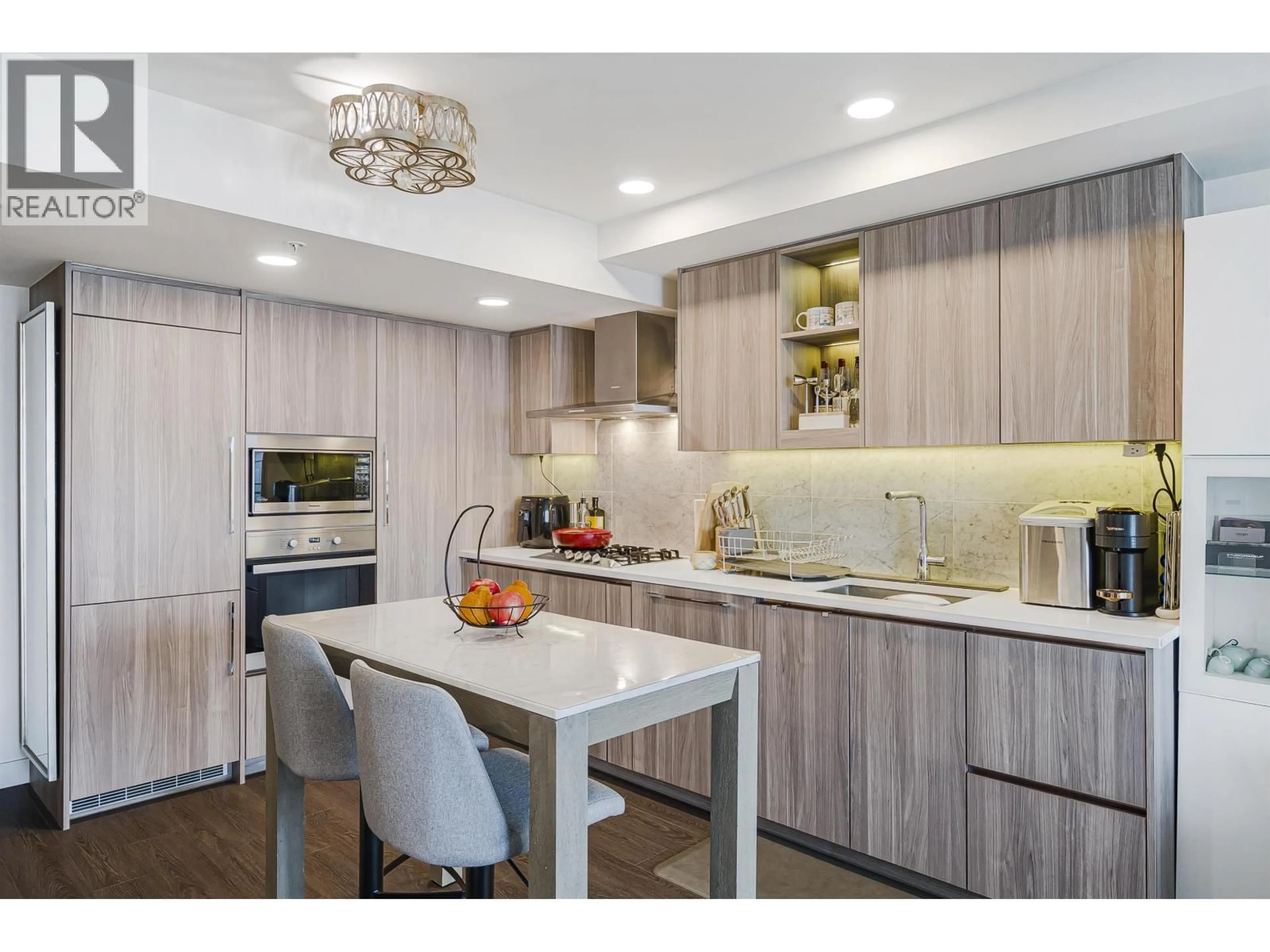 Contemporary kitchen, wood/laminate floor for 2505 - 433 MARINE DRIVE, Vancouver British Columbia V5X0H5