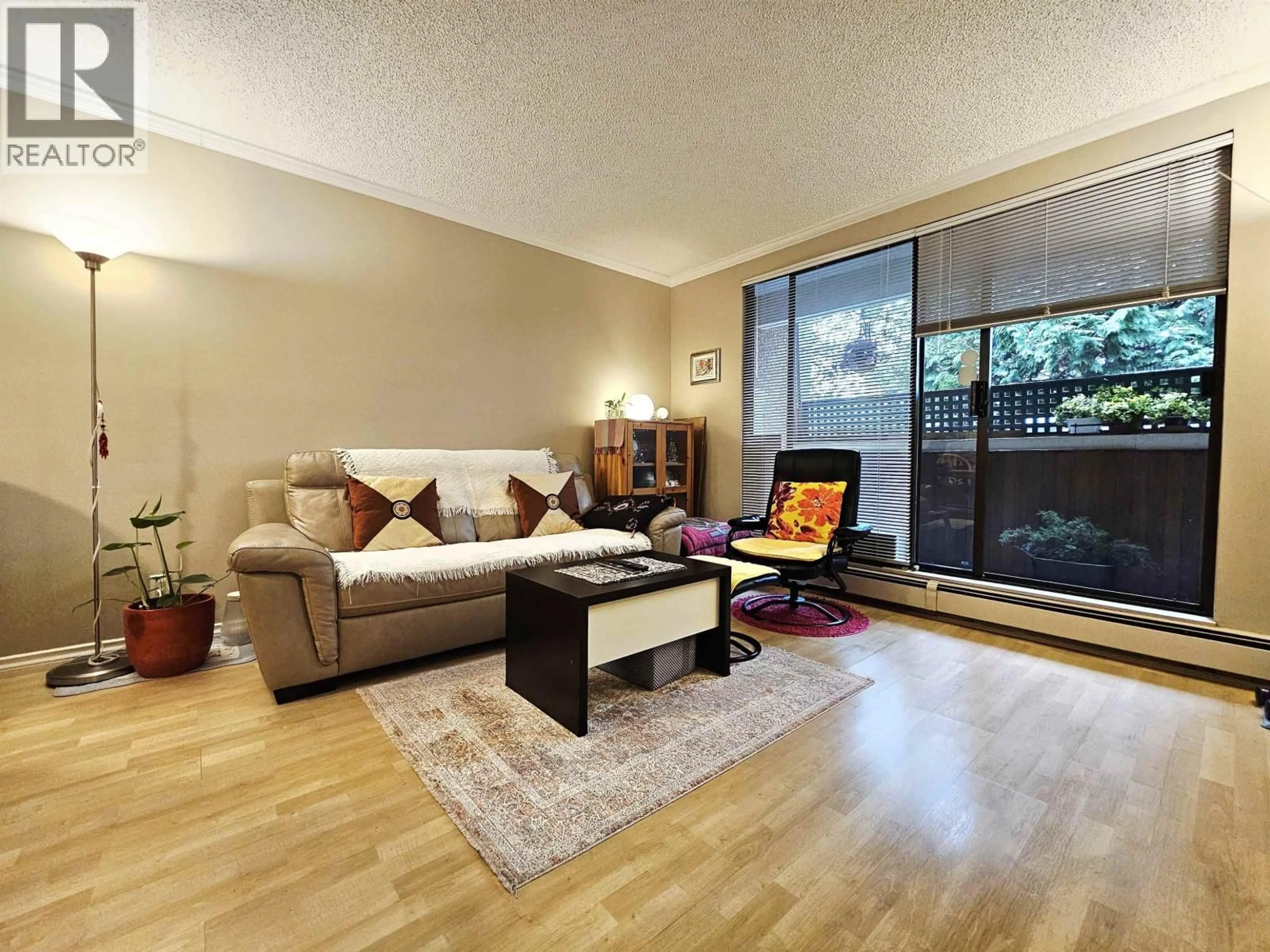 Living room with furniture, wood/laminate floor for 108 - 8540 CITATION DRIVE, Richmond British Columbia V6Y3A3