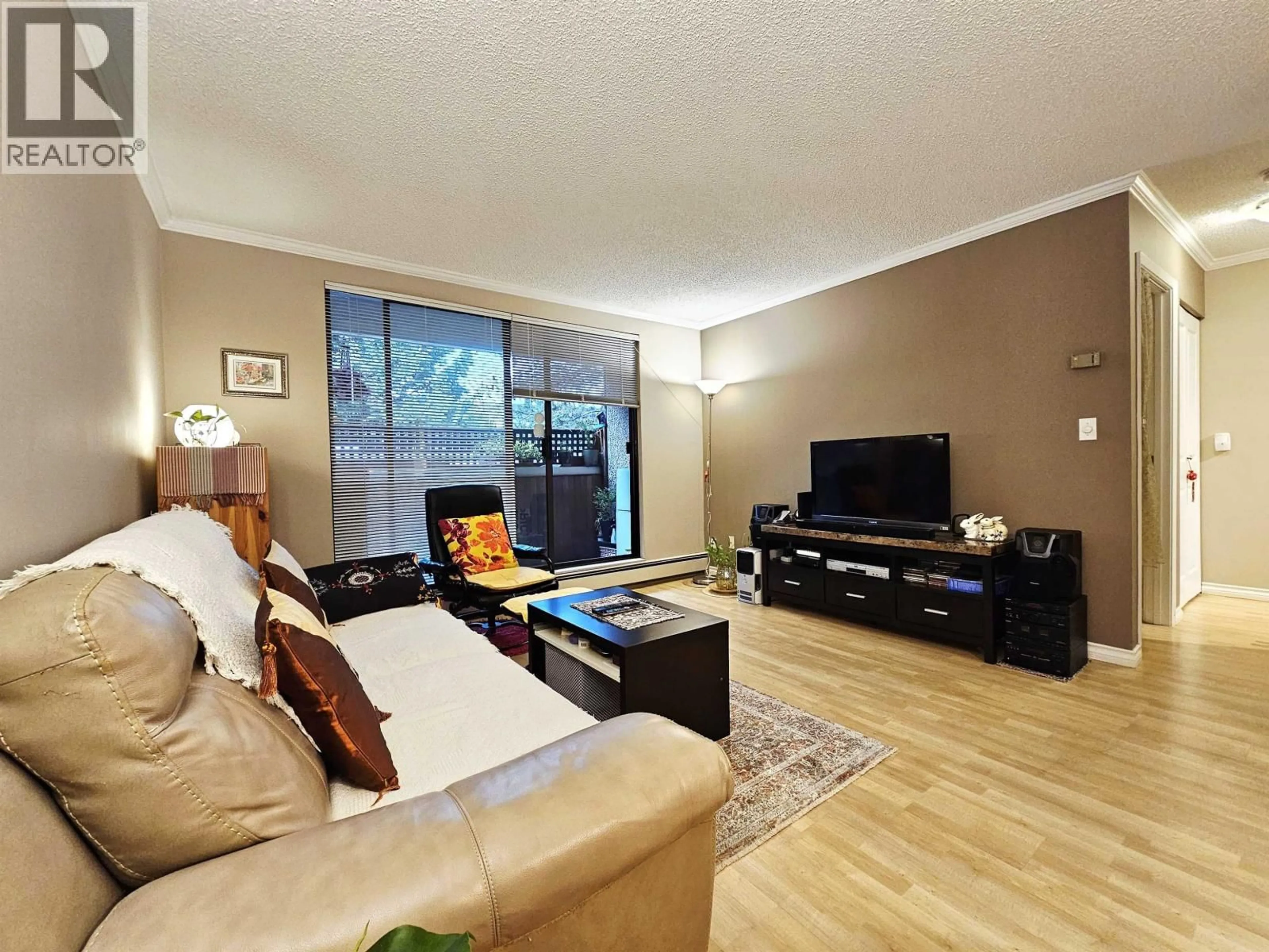 Living room with furniture, wood/laminate floor for 108 - 8540 CITATION DRIVE, Richmond British Columbia V6Y3A3