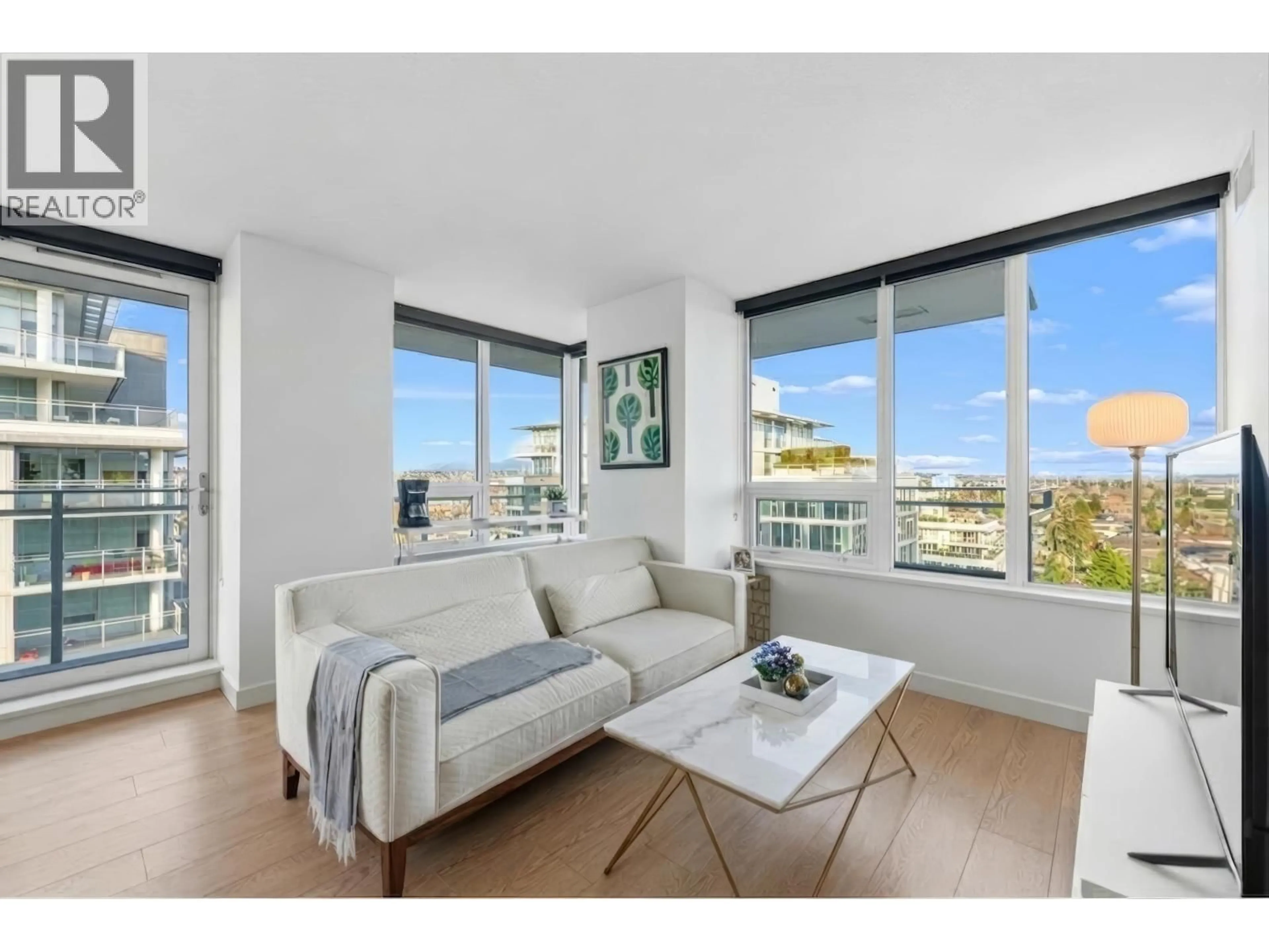 Living room with furniture, wood/laminate floor for 1702 - 3233 KETCHESON ROAD, Richmond British Columbia V6X0R3