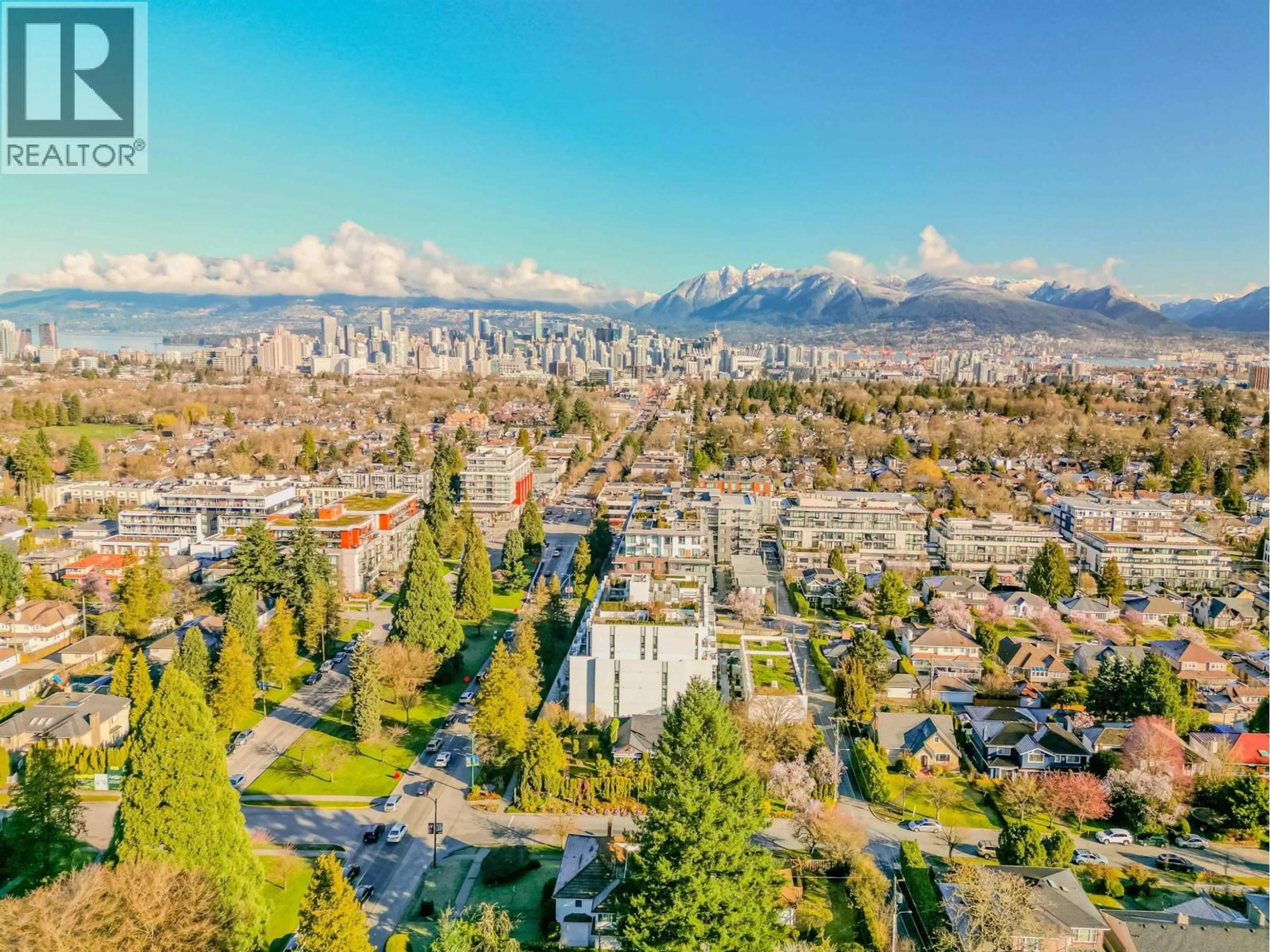 A pic from outside/outdoor area/front of a property/back of a property/a pic from drone, mountain view for 208 - 4408 CAMBIE STREET, Vancouver British Columbia V5Y0M2