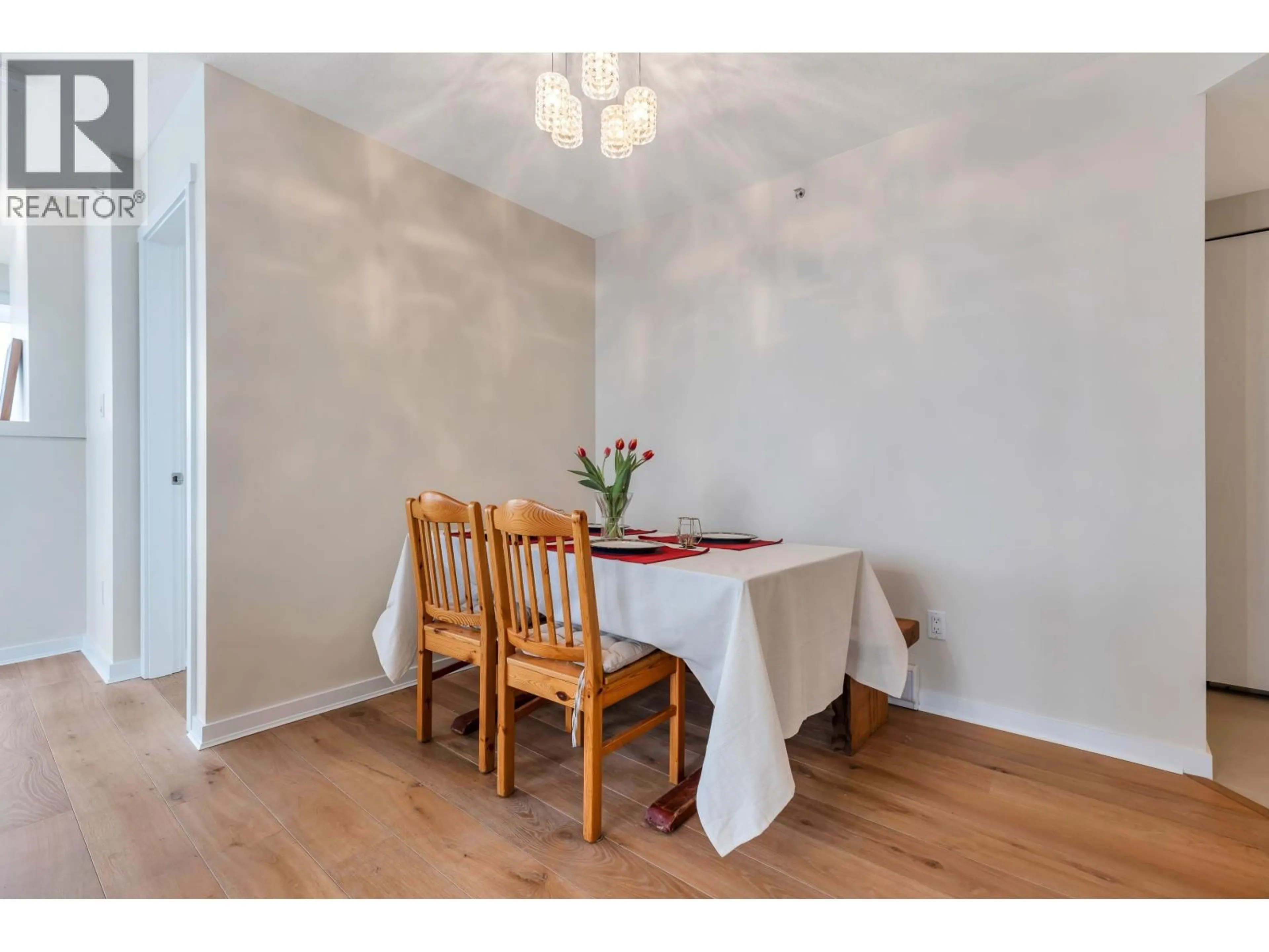 Dining room, wood/laminate floor for 2301 - 651 NOOTKA WAY, Port Moody British Columbia V3H0A1