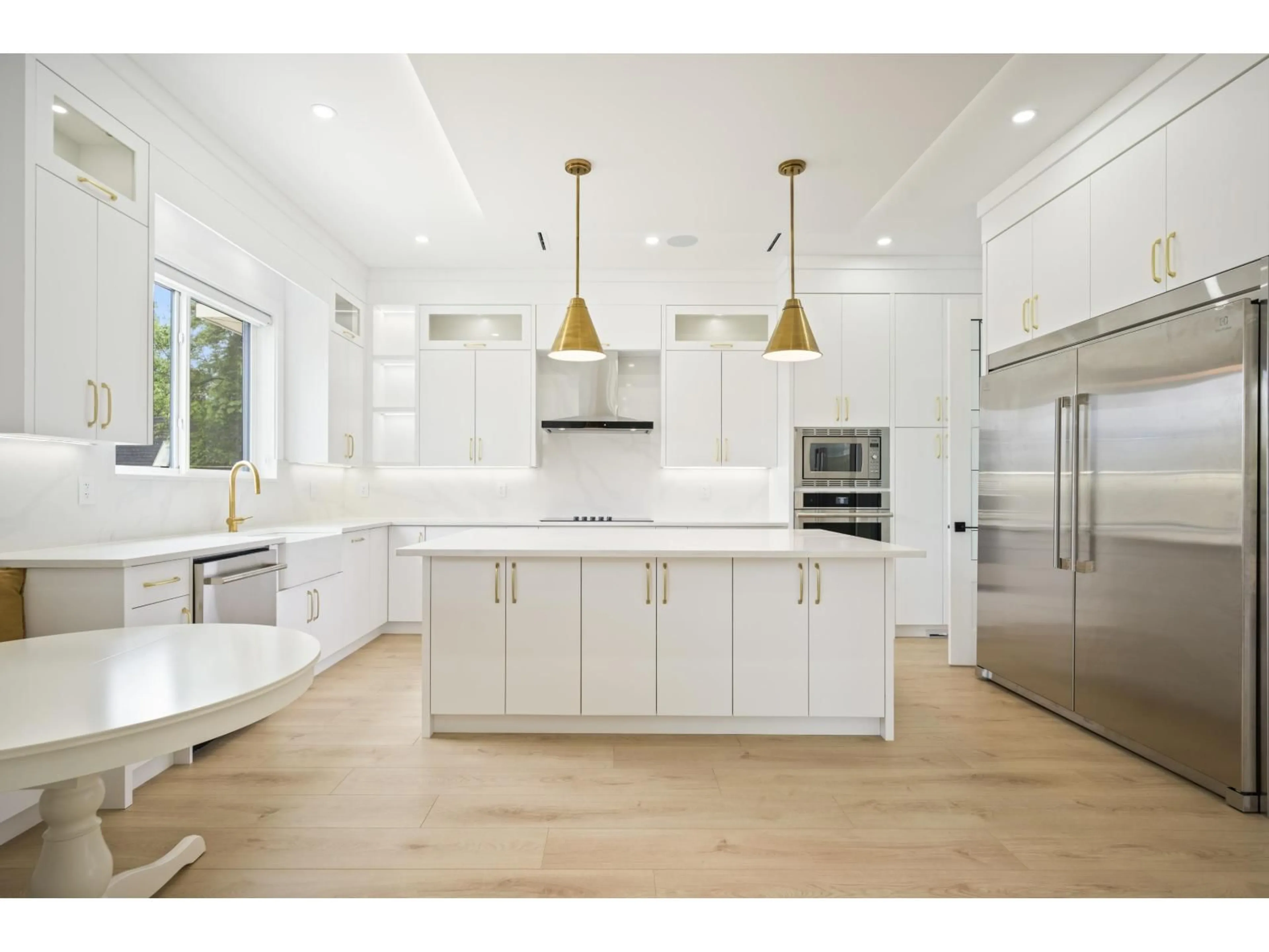 Open concept kitchen, wood/laminate floor for 10116 172A STREET, Surrey British Columbia V4N4H6