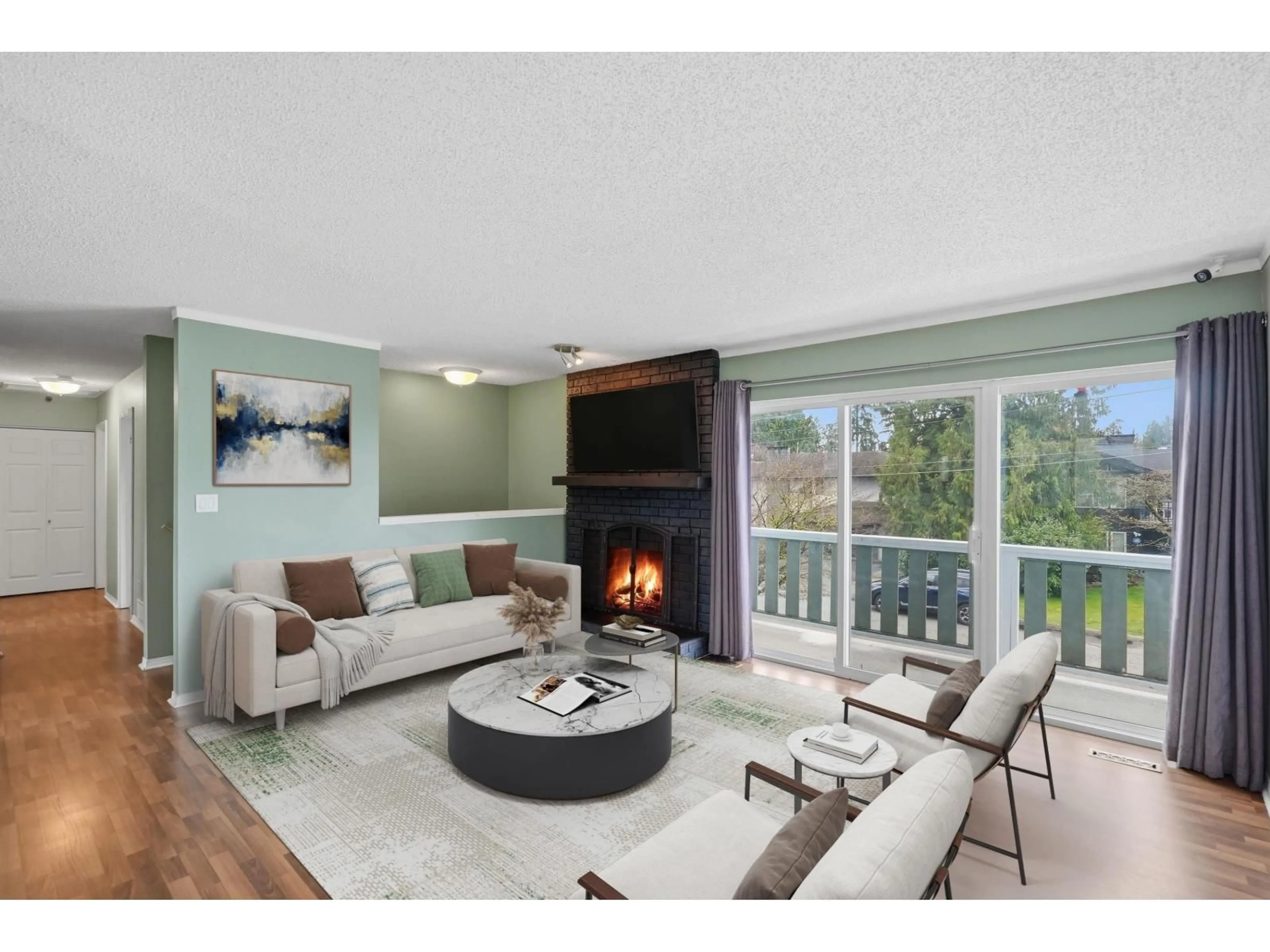 Living room with furniture, wood/laminate floor for 10337 JOHNSON WYND, Delta British Columbia V4C2N7