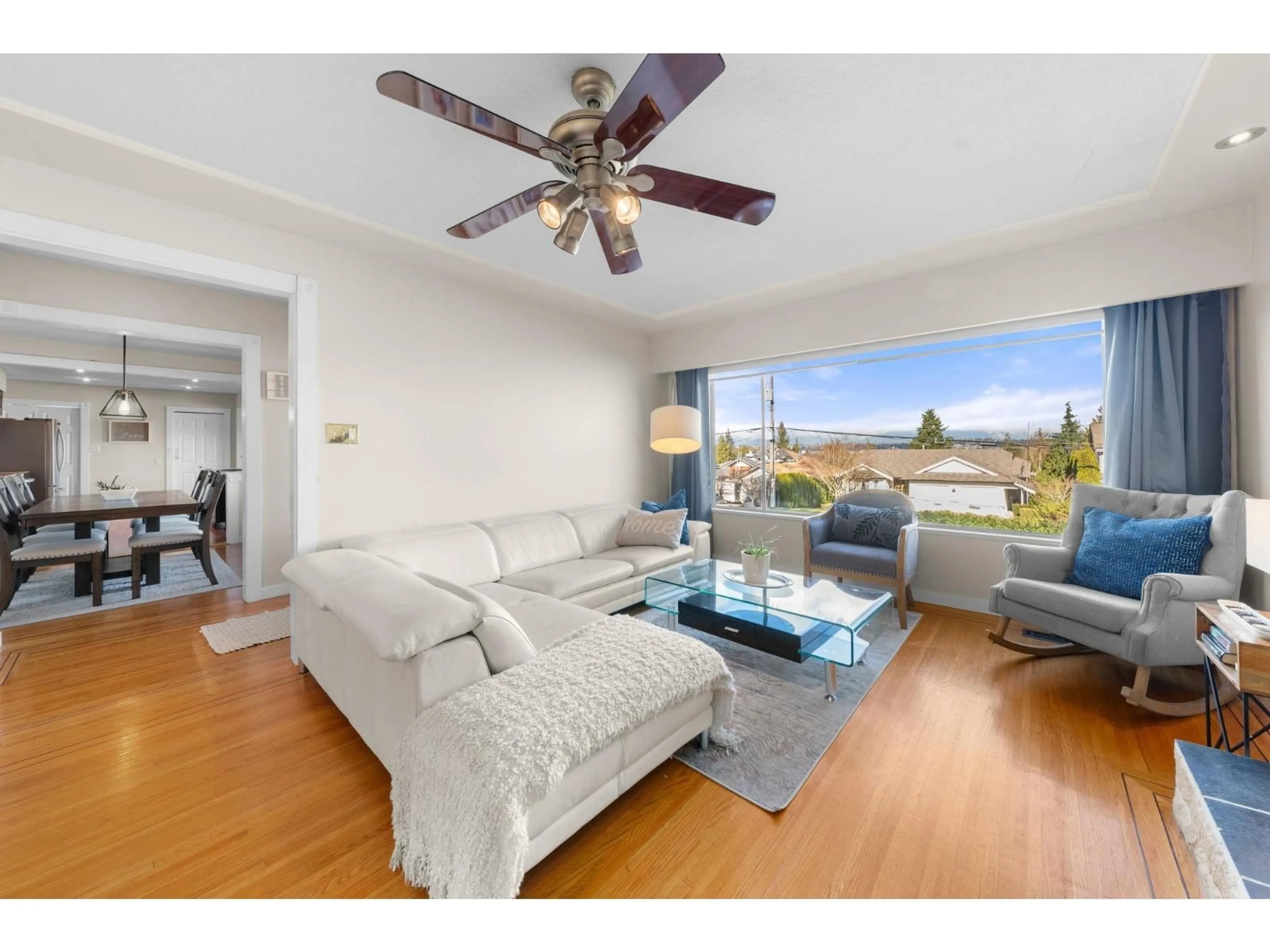 Living room with furniture, wood/laminate floor for 20722 46A AVENUE, Langley British Columbia V3A3J9