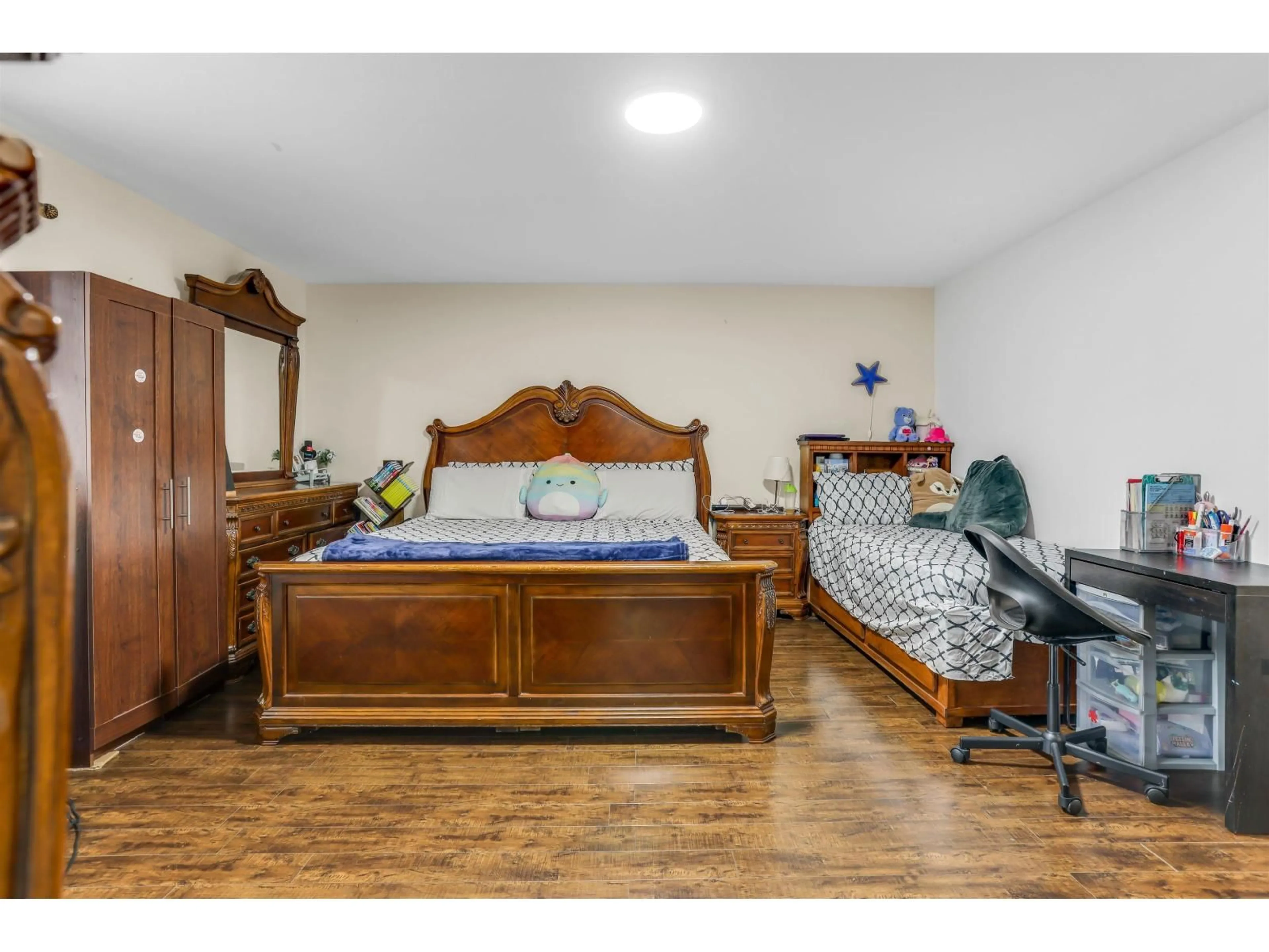 Bedroom with bed, wood/laminate floor for 8502 148 STREET, Surrey British Columbia V3S3G4