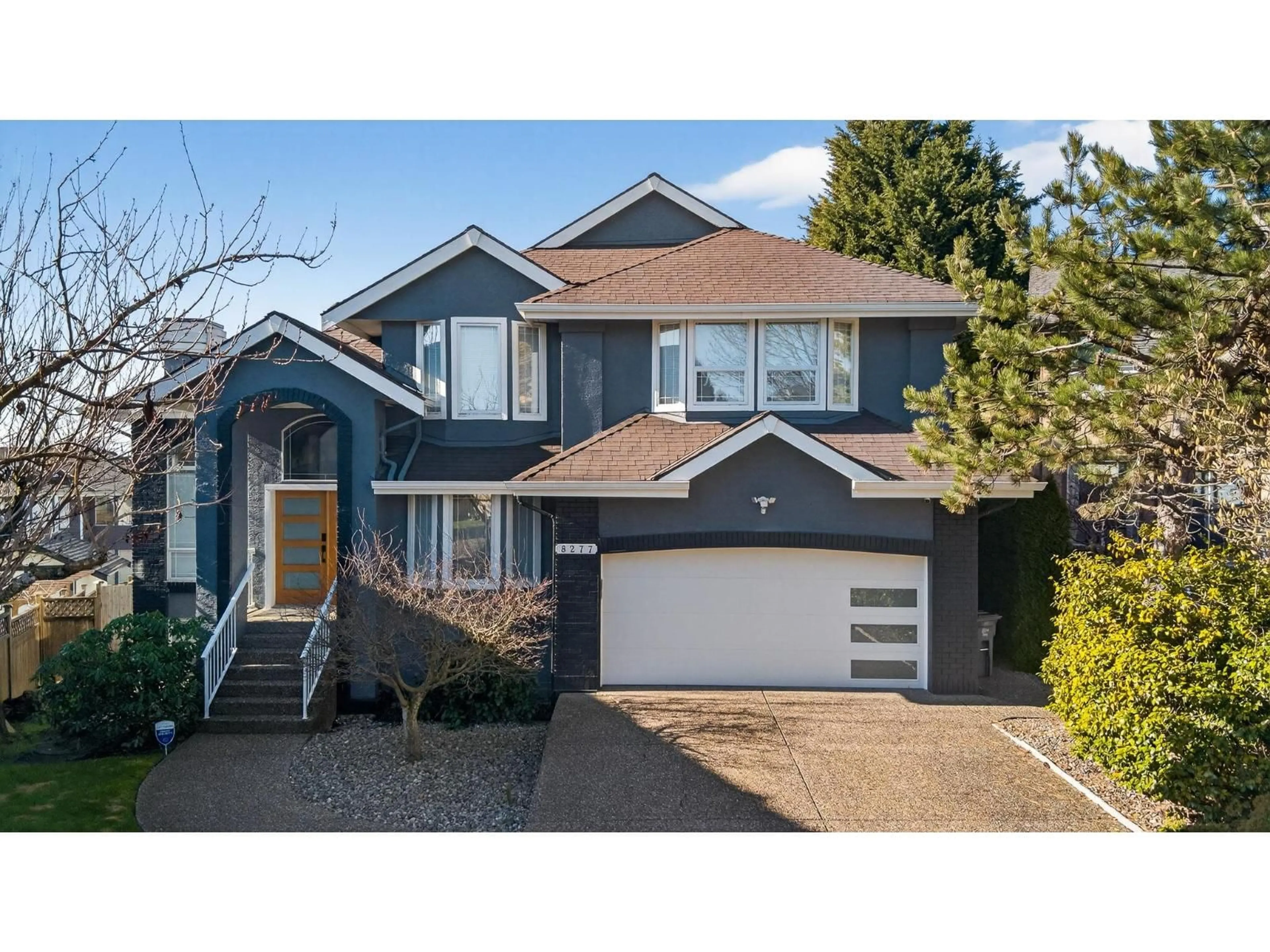 Home with vinyl exterior material, street for 8277 153B STREET, Surrey British Columbia V3S8K6