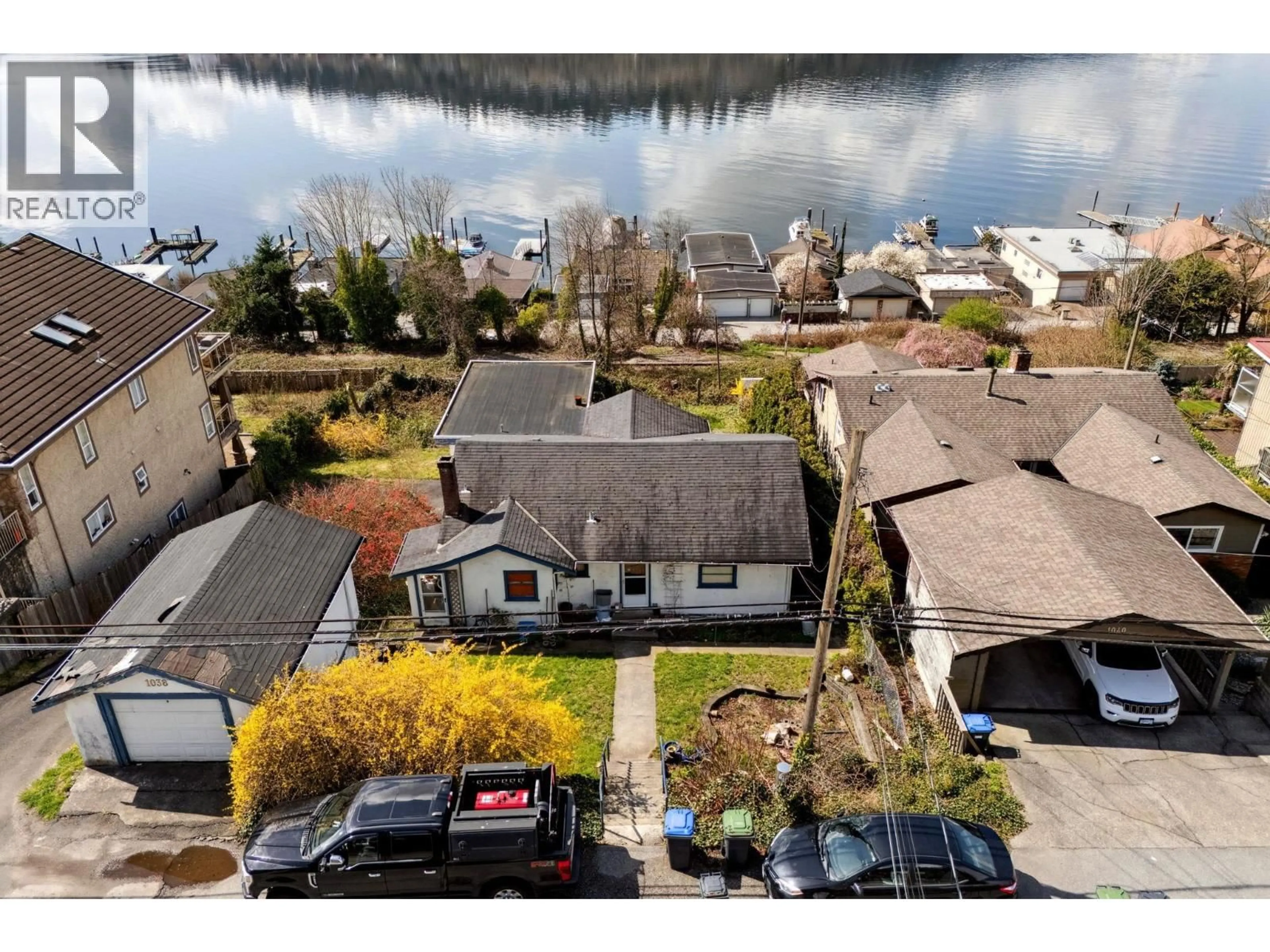 A pic from outside/outdoor area/front of a property/back of a property/a pic from drone, water/lake/river/ocean view for 1038 IOCO ROAD, Port Moody British Columbia V3H2X1