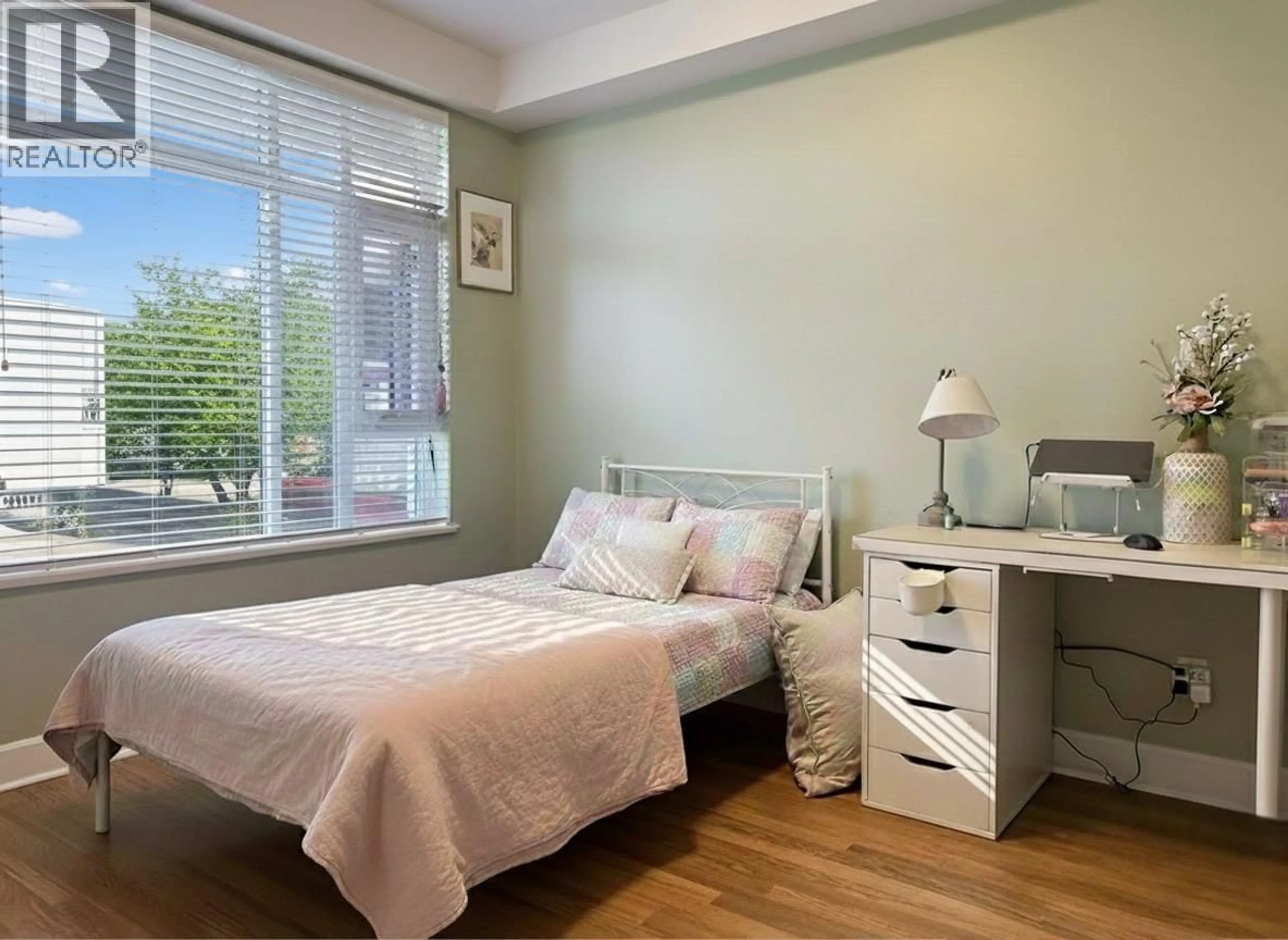 Bedroom with bed, wood/laminate floor for 304 - 6611 ECKERSLEY ROAD, Richmond British Columbia V6Y0B7