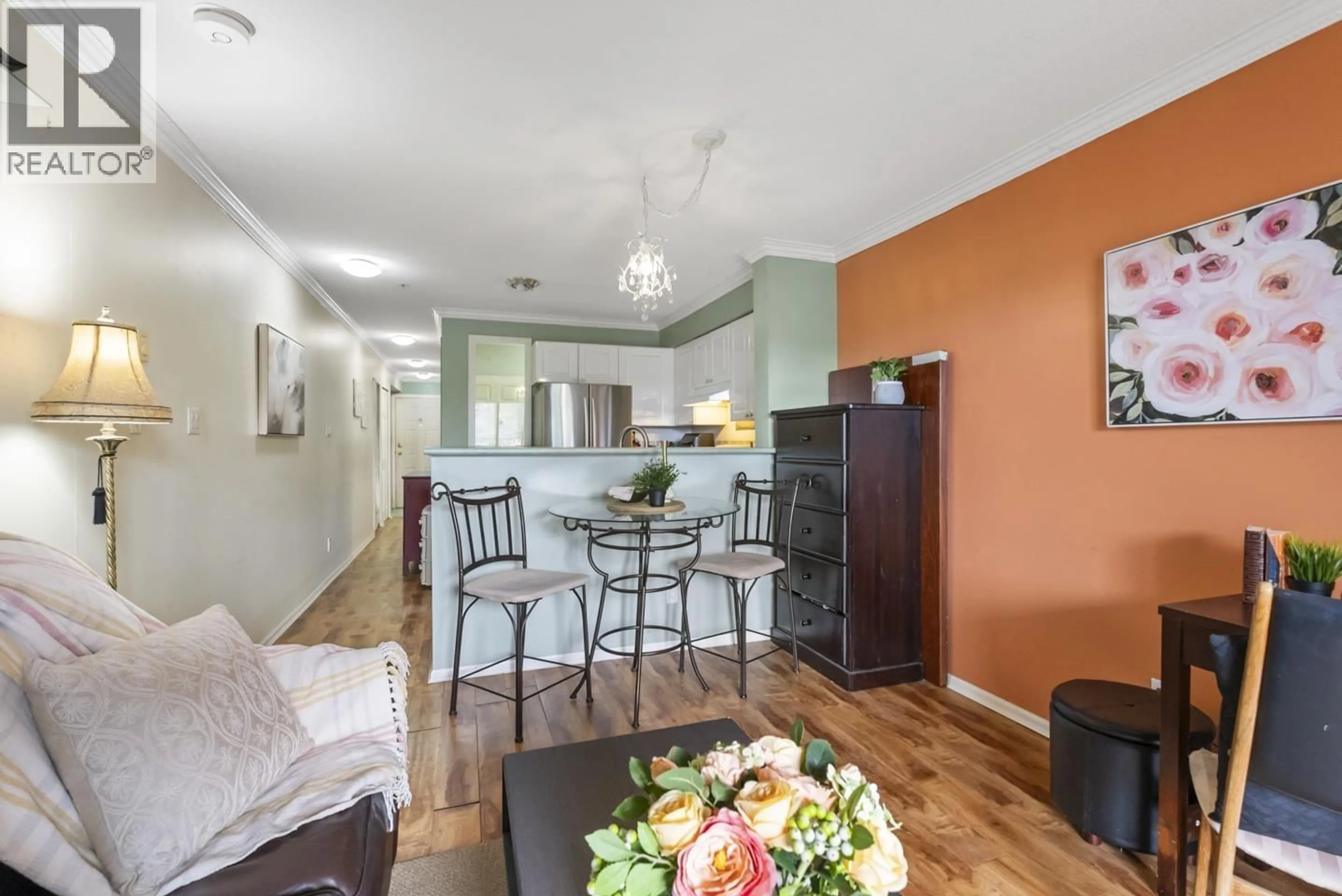 Open concept kitchen, wood/laminate floor for 202 - 868 KINGSWAY WAY, Vancouver British Columbia V5V3C3