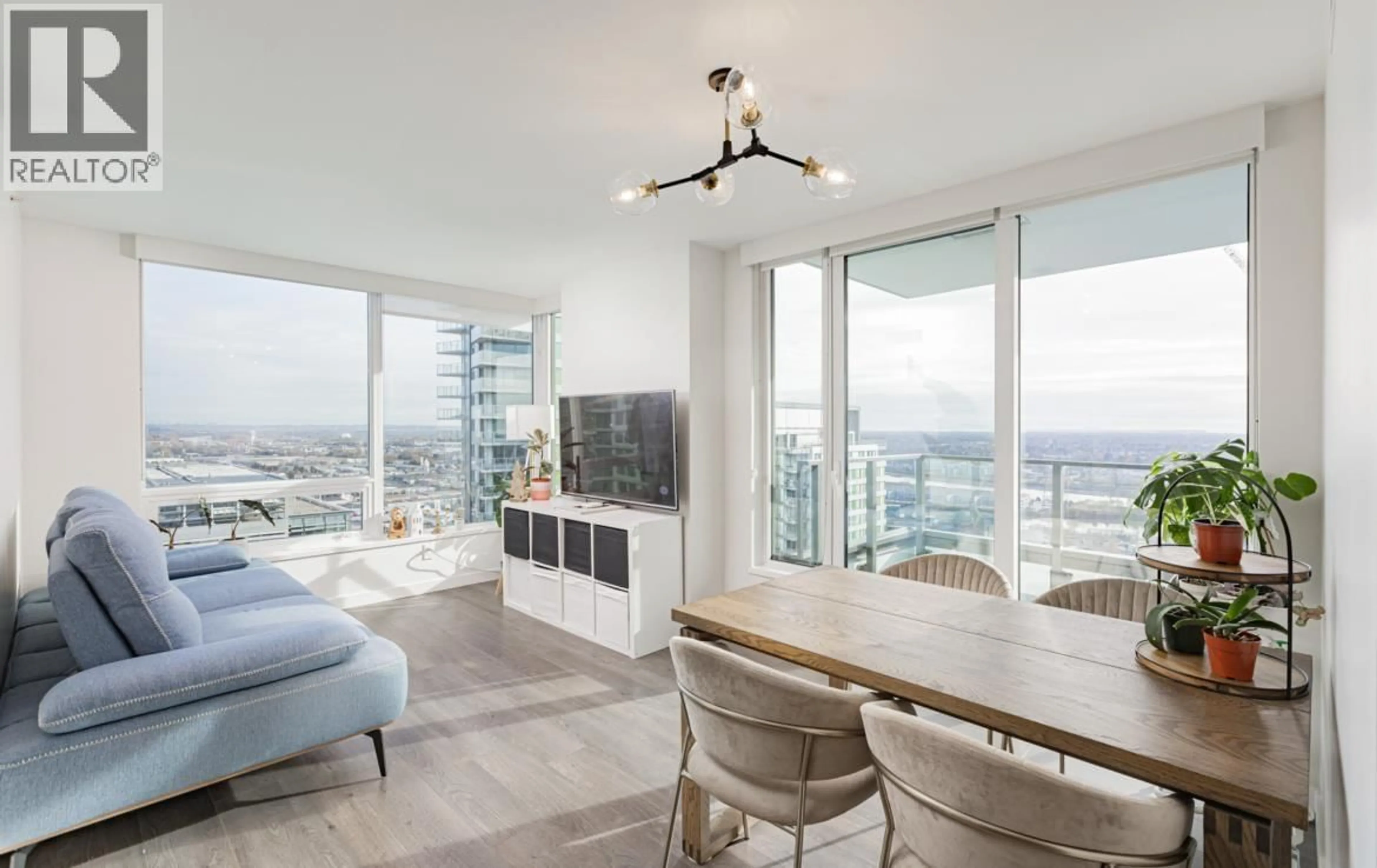 Living room with furniture, unknown for 2907 - 8189 CAMBIE STREET, Vancouver British Columbia V6P0G6