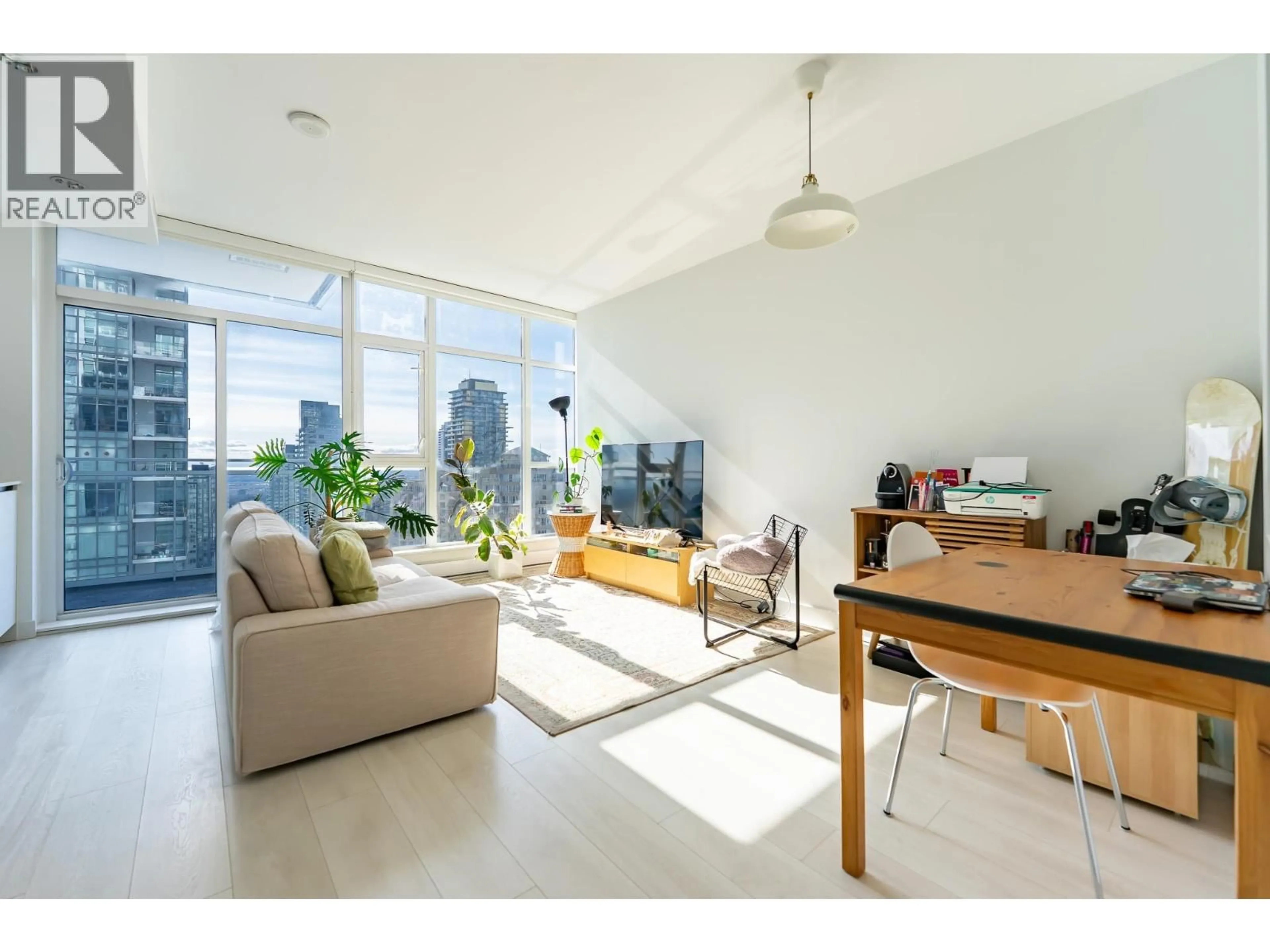 Living room with furniture, wood/laminate floor for 3203 - 4670 ASSEMBLY WAY, Burnaby British Columbia V5H0H3