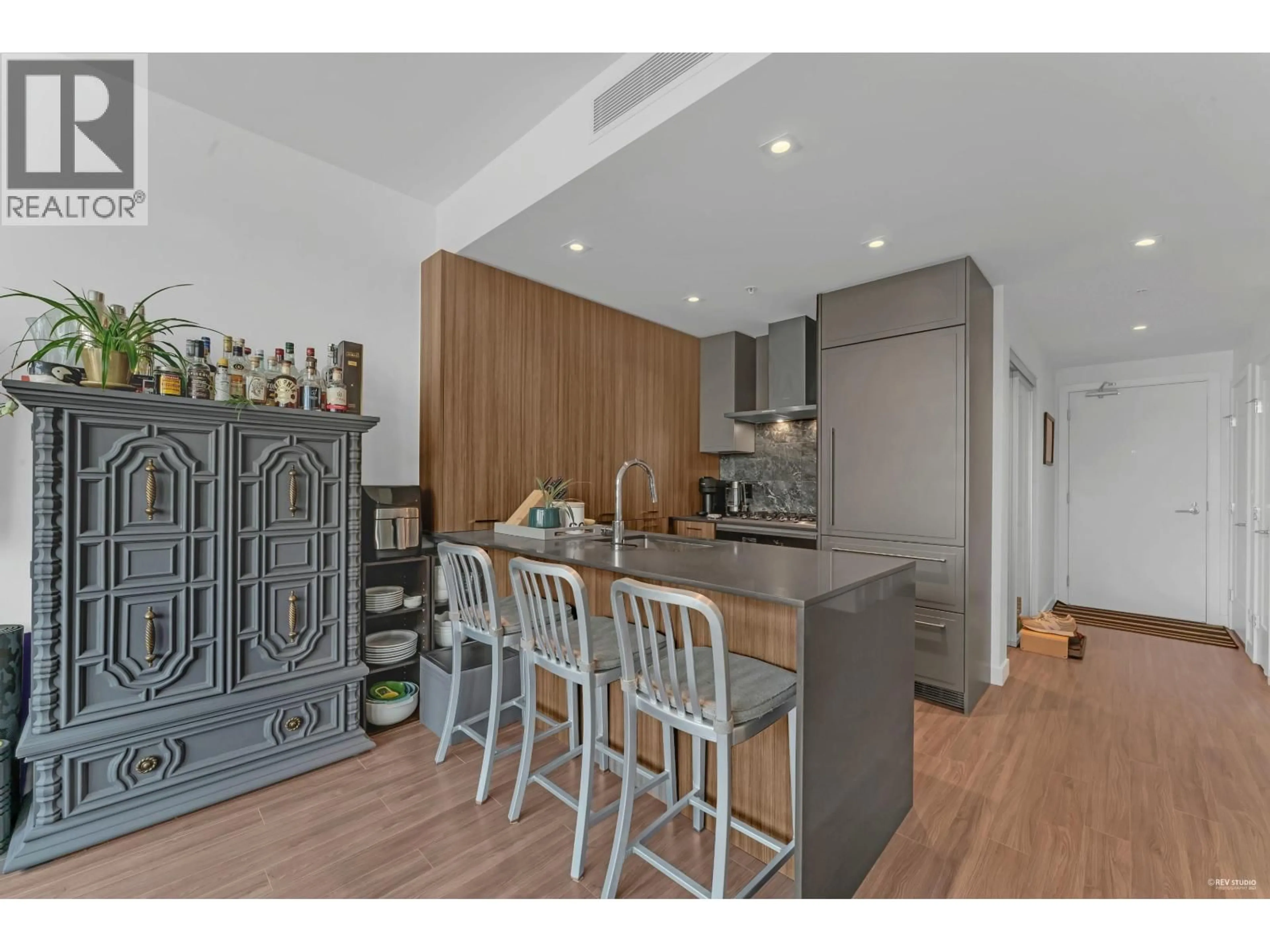 Open concept kitchen, wood/laminate floor for 407 - 2288 ALPHA AVENUE, Burnaby British Columbia V5C0L9