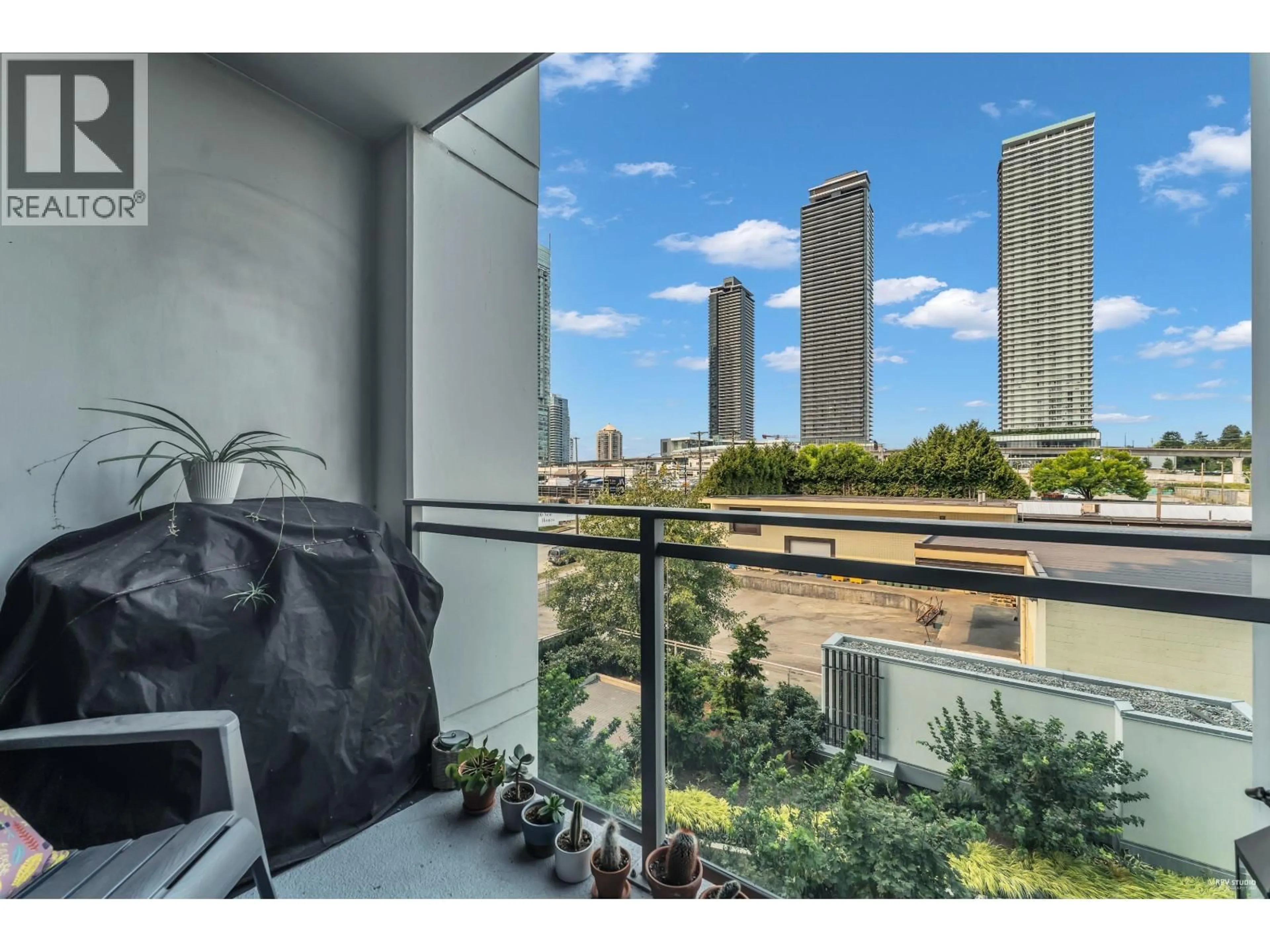 Balcony in the apartment, city buildings view from balcony for 407 - 2288 ALPHA AVENUE, Burnaby British Columbia V5C0L9